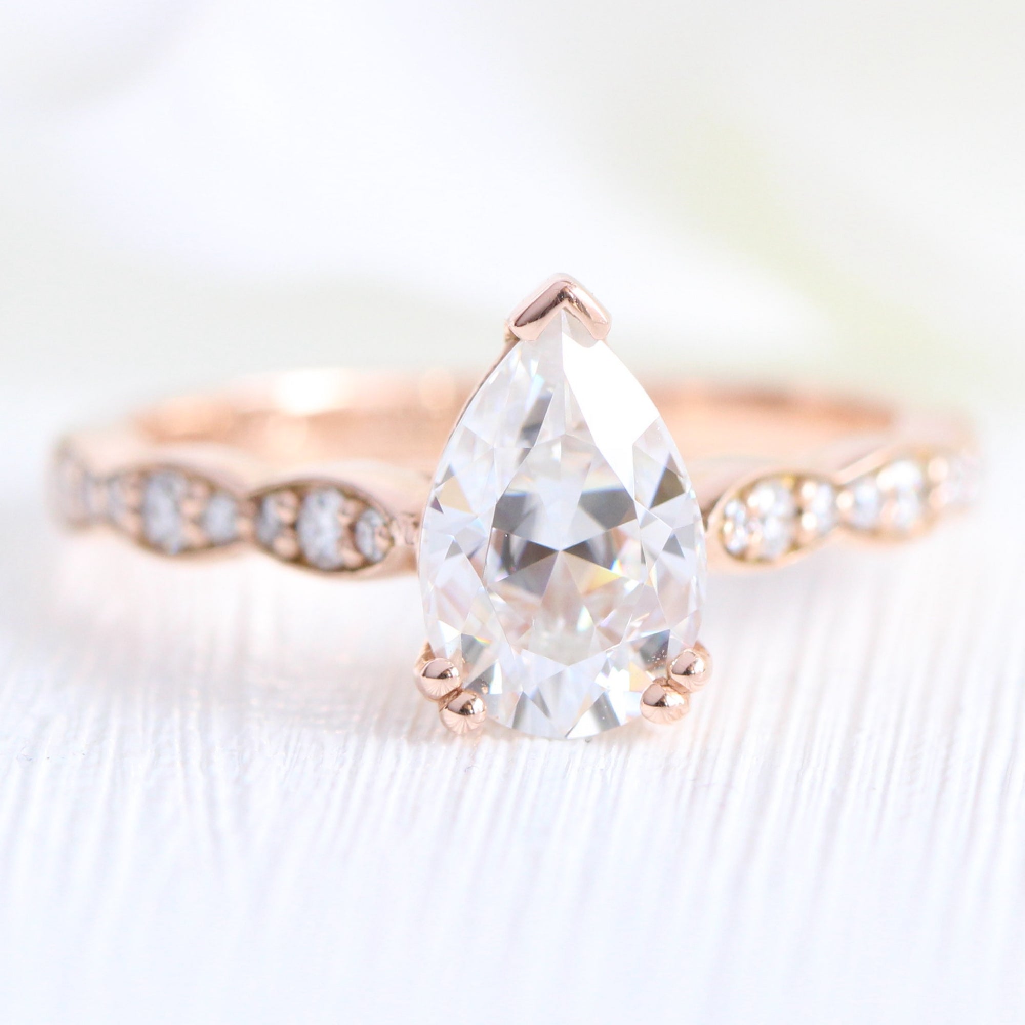 Moissanite diamond ring rose gold pear solitaire engagement ring la more design jewelry