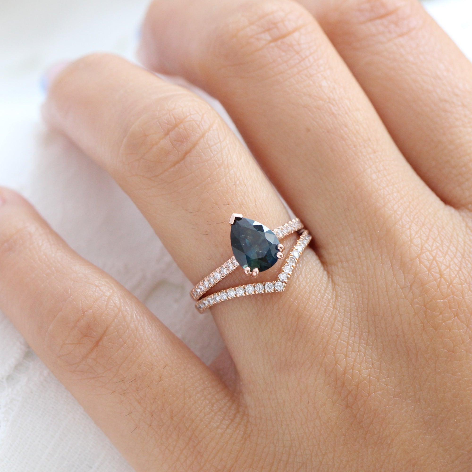 Solitaire pear teal green sapphire ring rose gold pave diamond band la more design jewelry