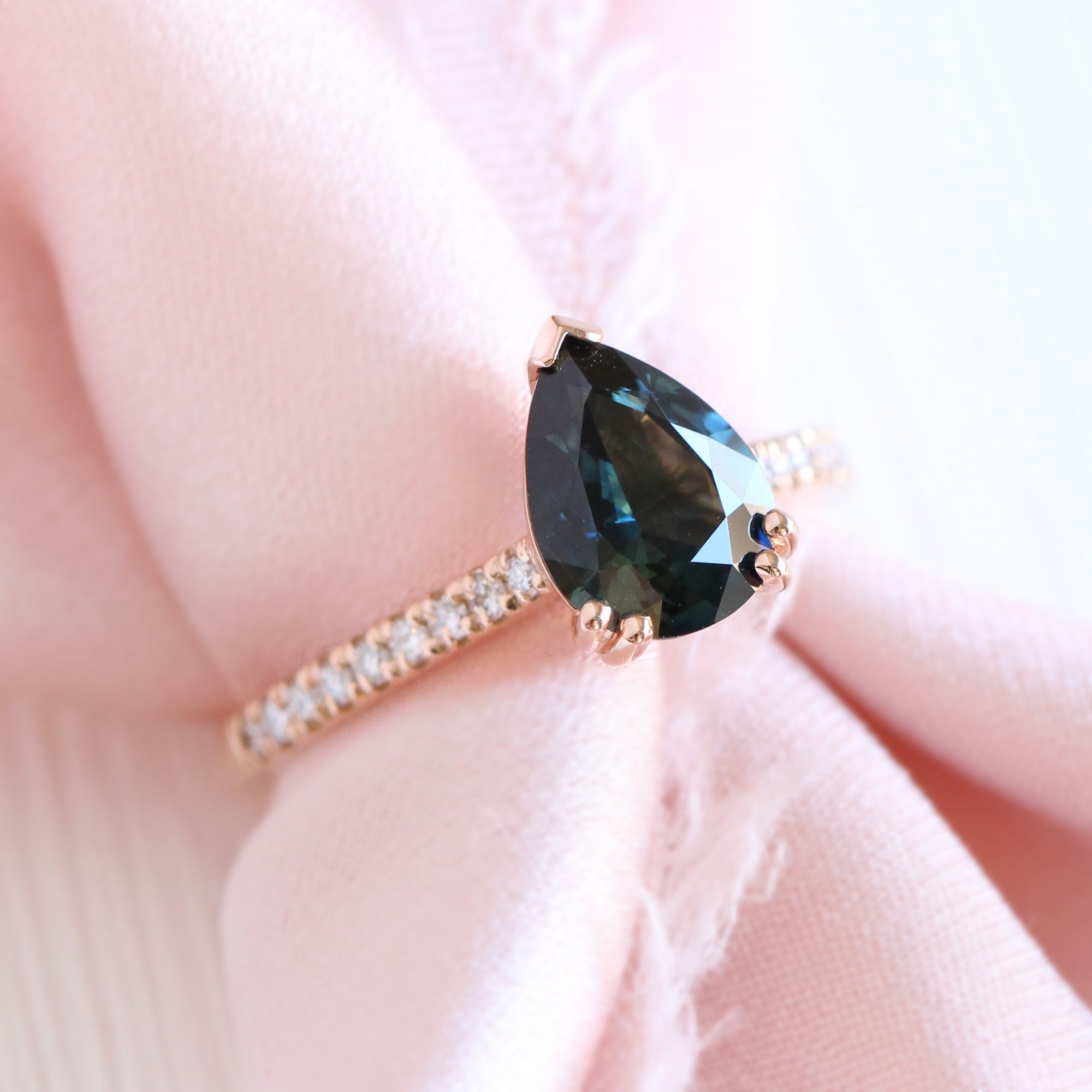 Solitaire pear teal green sapphire ring rose gold pave diamond band la more design jewelry