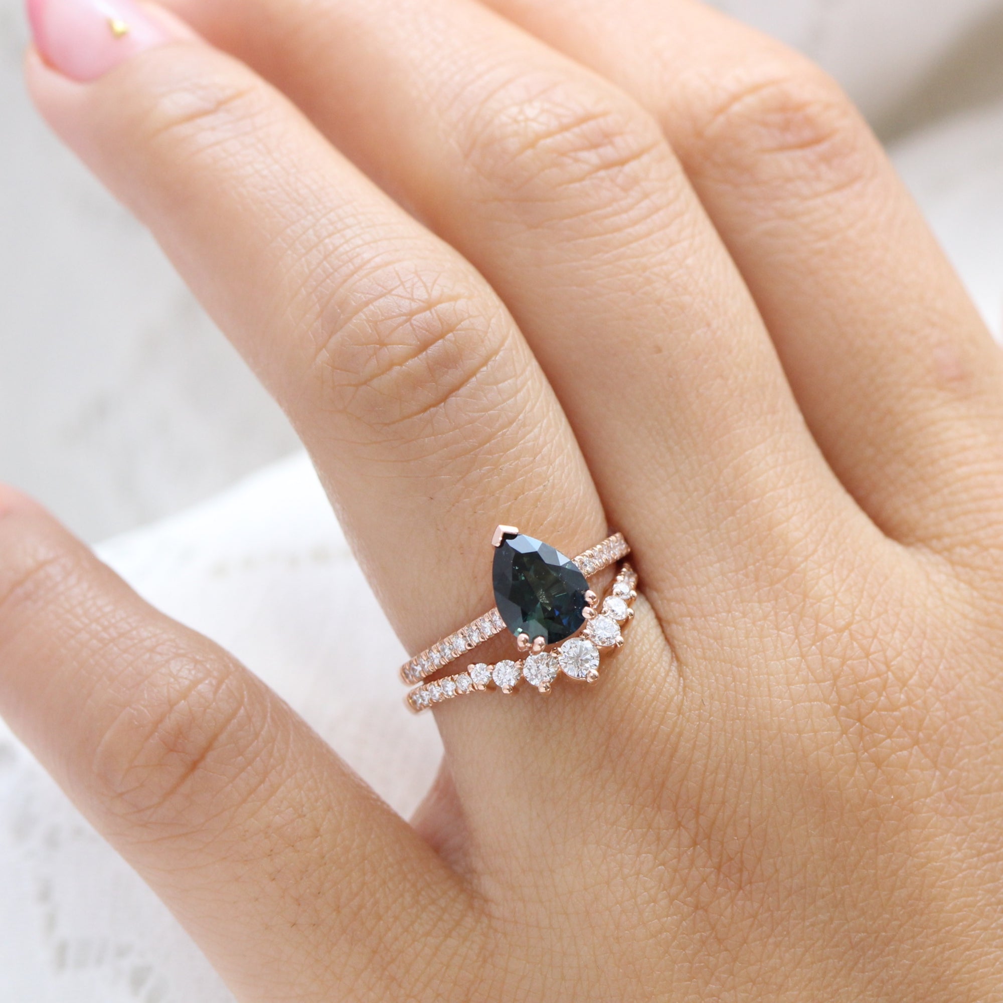 Solitaire pear teal green sapphire ring rose gold pave diamond band la more design jewelry