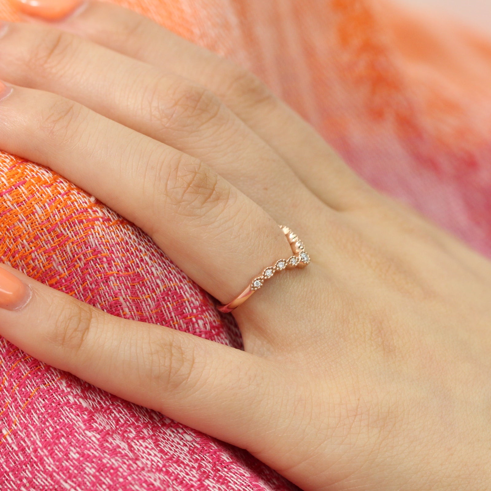 V shaped diamond ring in rose gold curved wedding band by la more design
