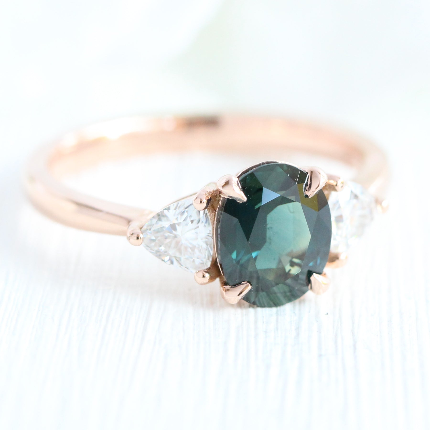 Teal green sapphire engagement ring rose gold low profile 3 stone ring la more design jewelry