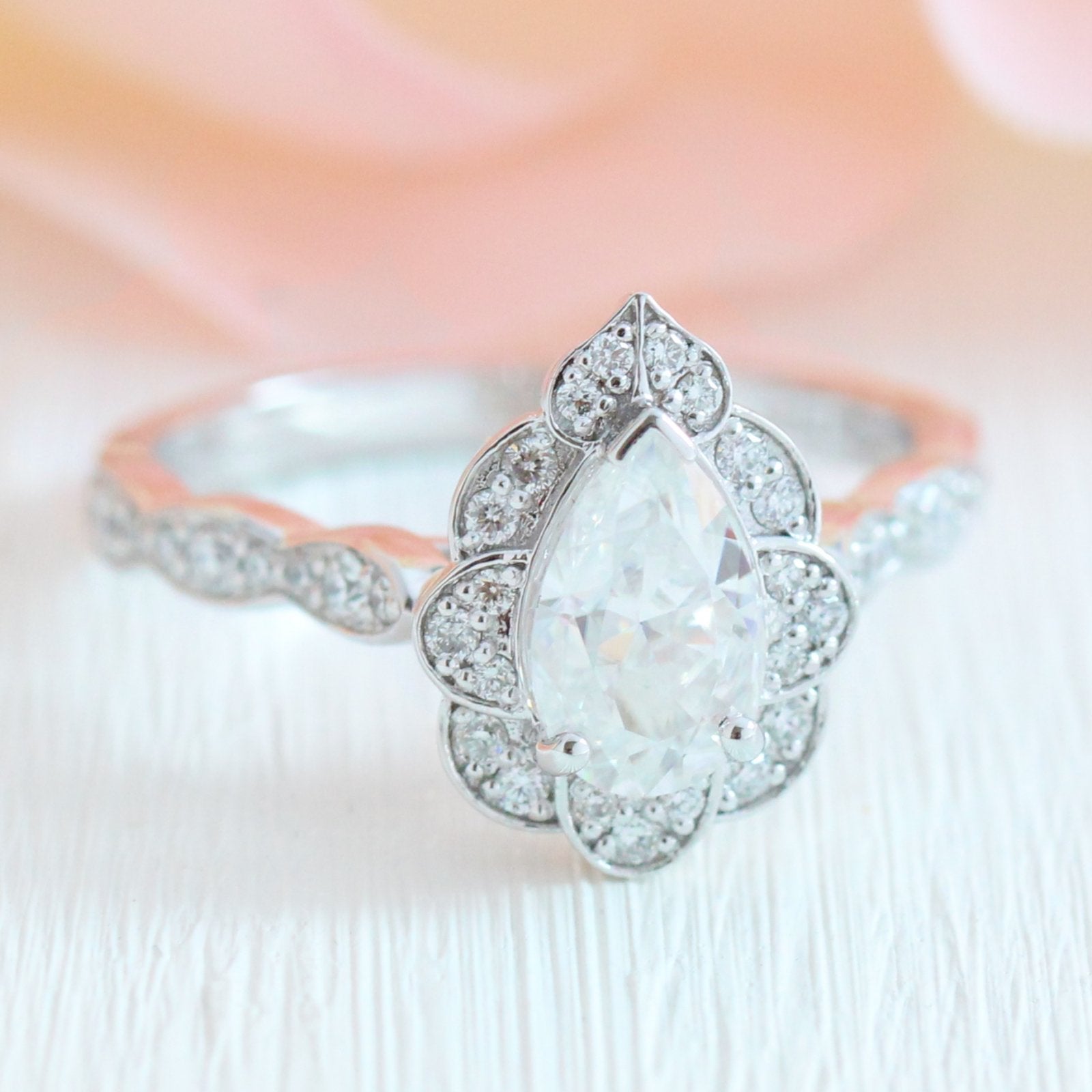 Vintage floral pear moissanite engagement ring white gold diamond scalloped band by la more design jewelry