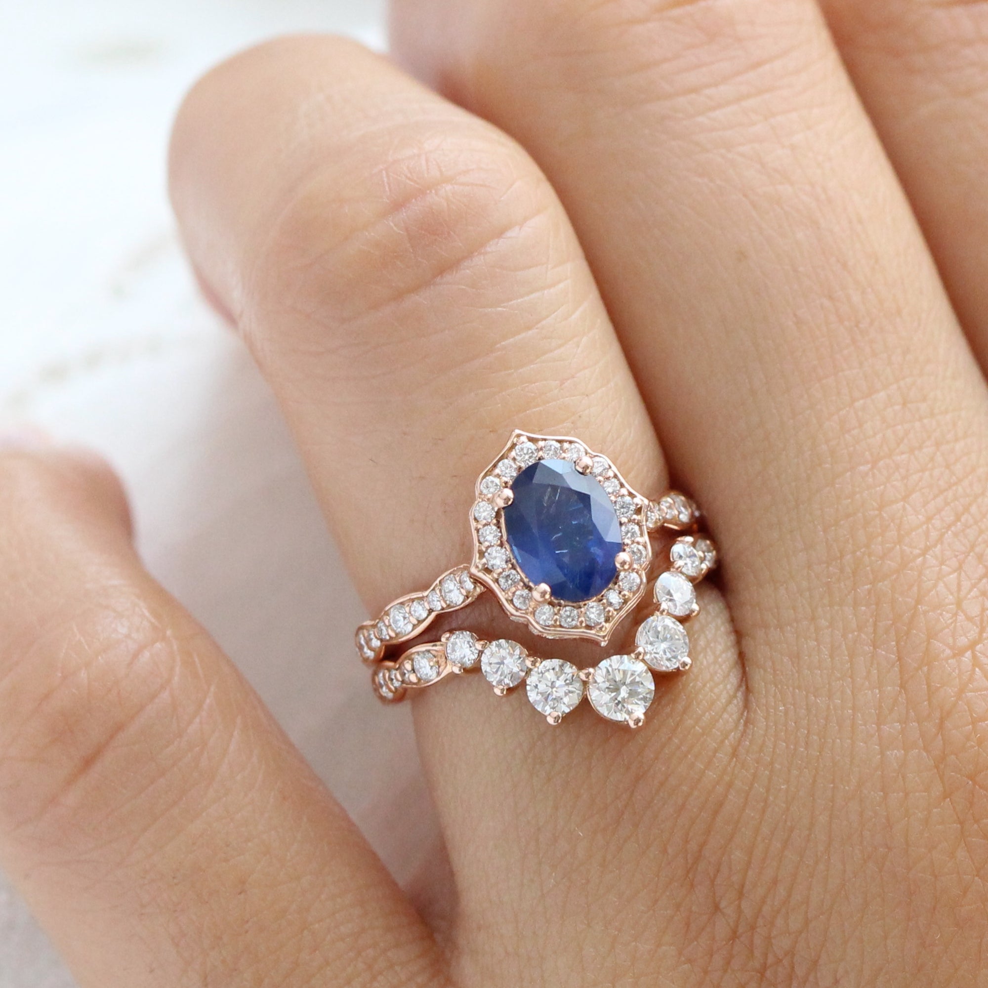 Vintage halo diamond sapphire ring stack rose gold oval curved diamond wedding band la more design jewelry