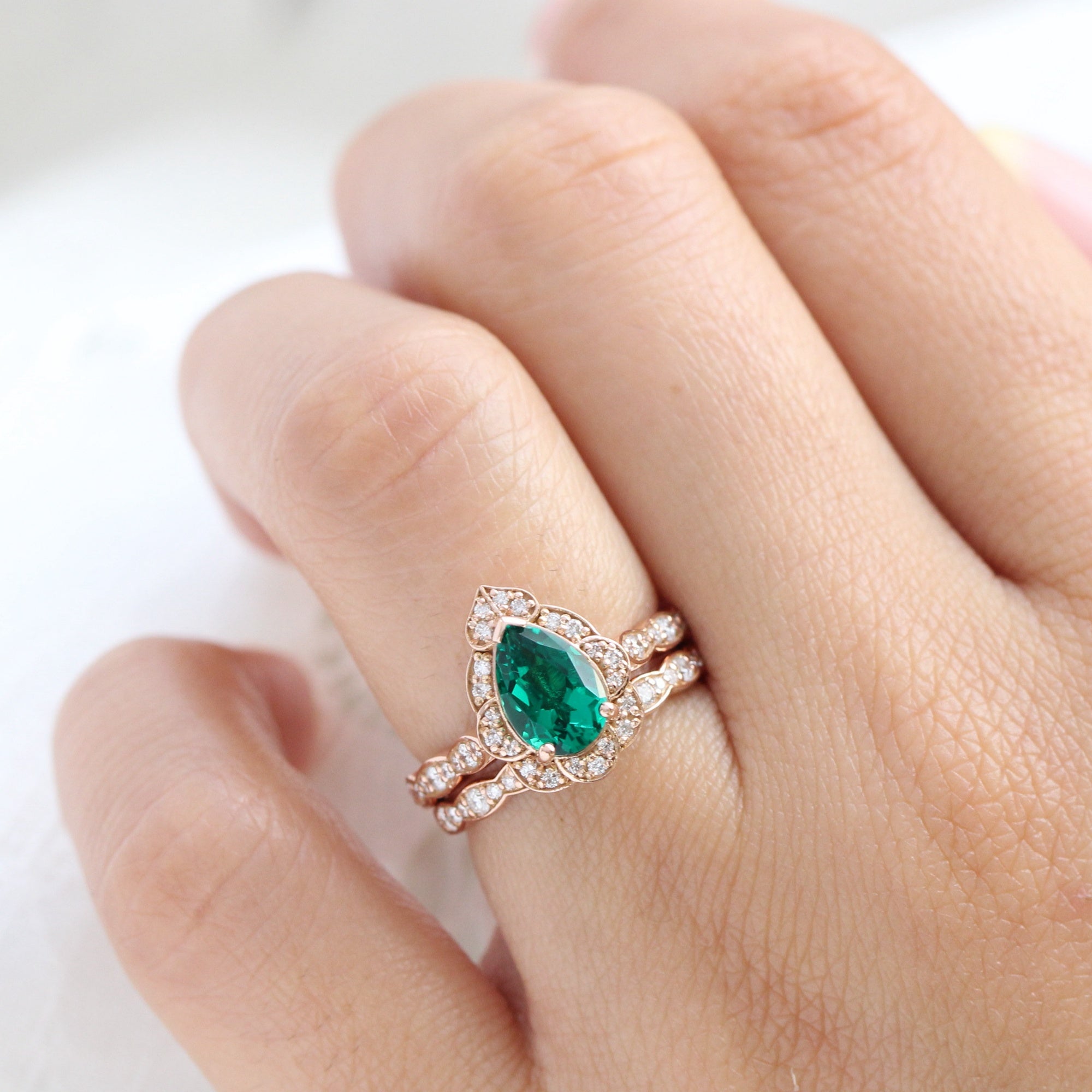 Vintage halo pear emerald ring stack rose gold matching diamond wedding band la more design jewelry