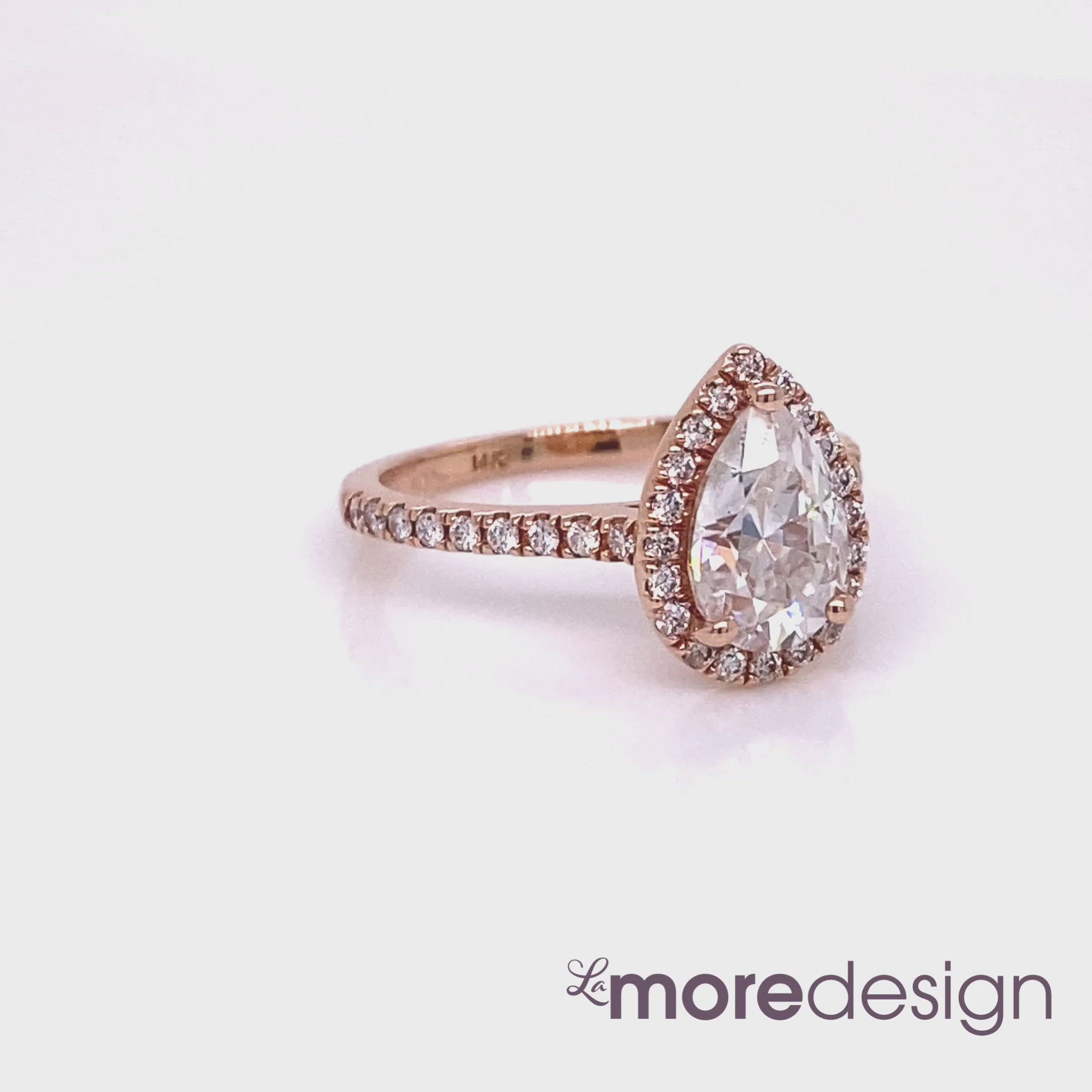 pear moissanite ring rose gold halo diamond engagement ring by la more design