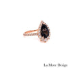 Breathtakingly gorgeous and unique large grey spinel diamond ring is crafted in a 14k rose gold tiara halo diamond ring setting featuring a large 2.05-carat pear cut natural grey spinel center encircled by a halo of brilliant white diamonds to create the truly one of a kind look ~ the total gemstone and diamond weight of the whole ring is 2.75 ct.tw.