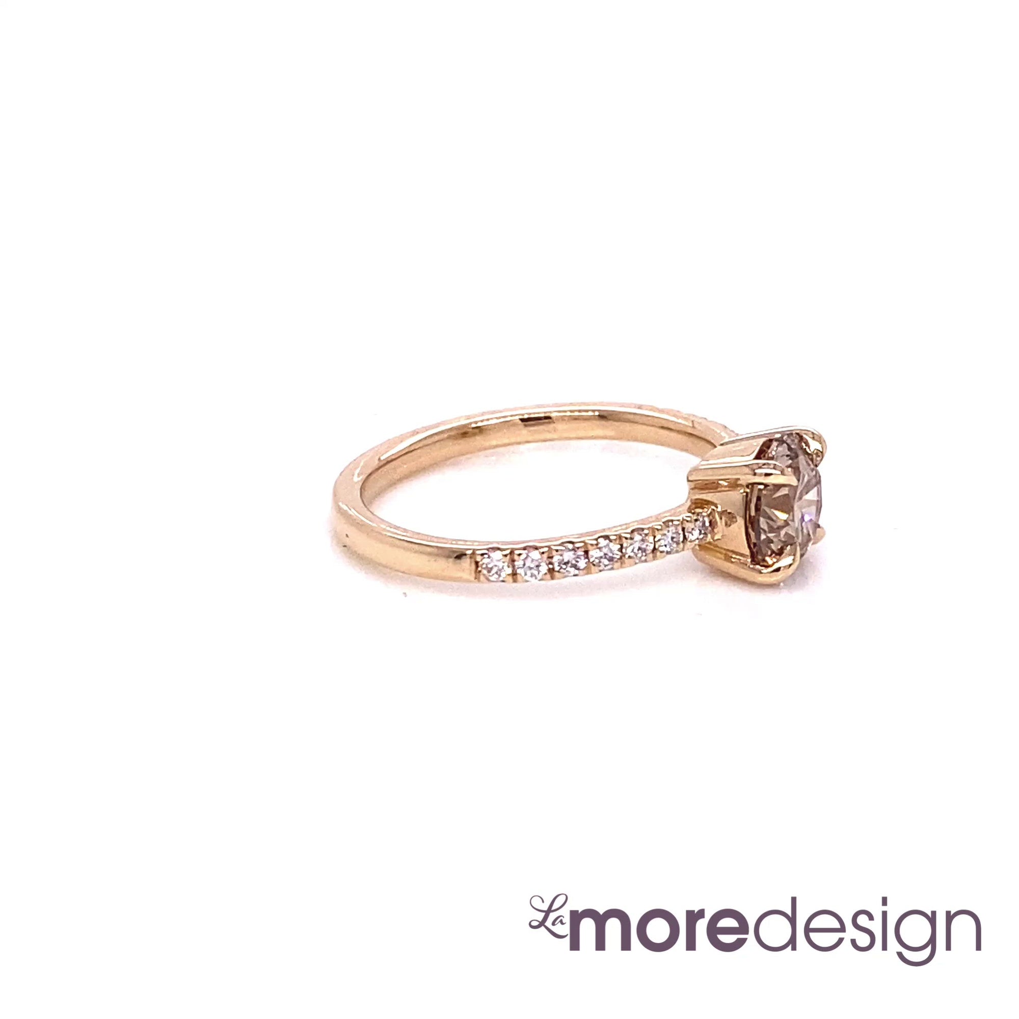 This stunningly gorgeous champagne diamond engagement ring features a 1.01 carat round cut natural champagne diamond set in a 14k rose gold flat set low profile solitaire ring setting which lays flat perfectly on top of your finger for comfortable wear.   All our curved wedding bands can nest beautifully with this low profile solitaire engagement ring!