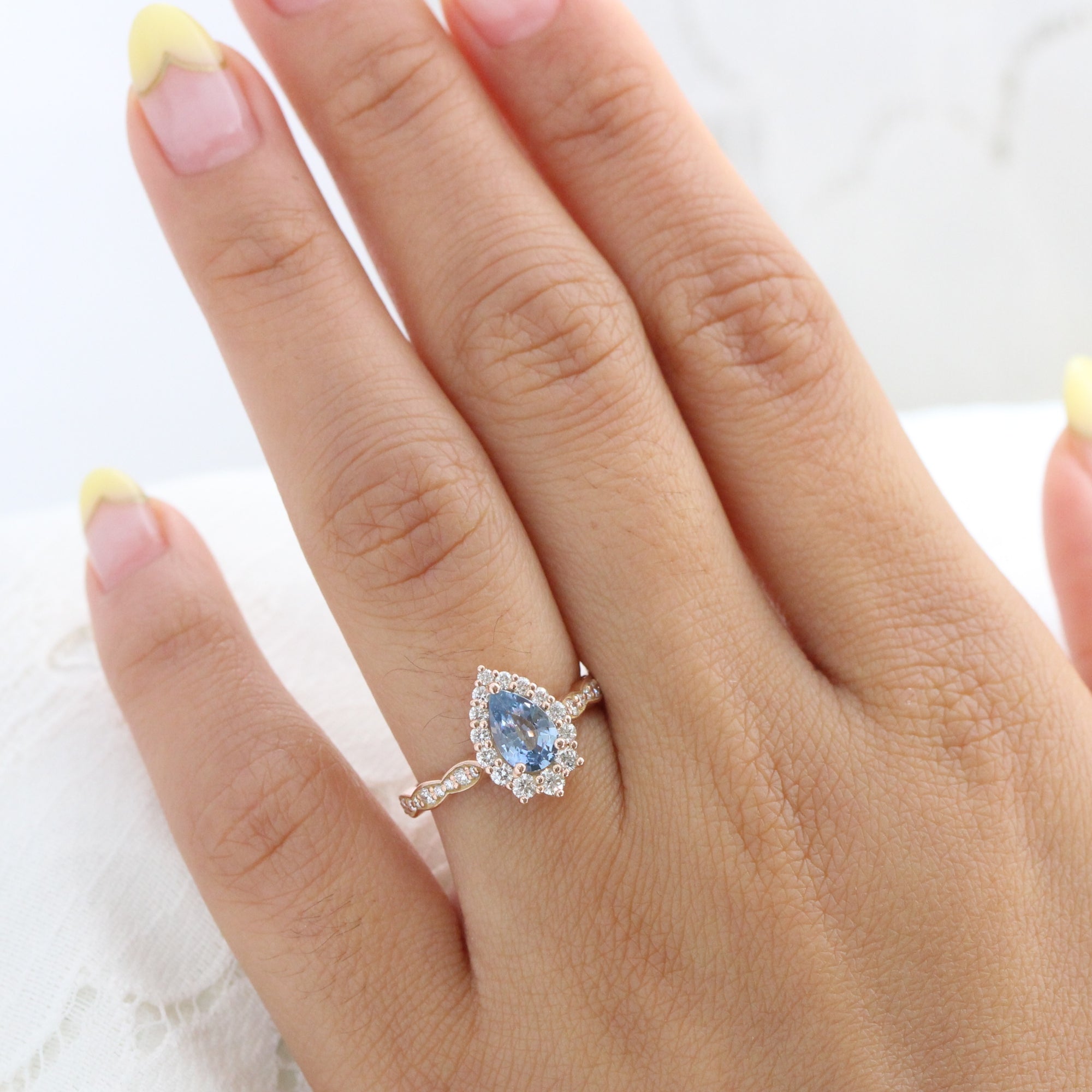 aqua blue sapphire ring rose gold halo diamond pear engagement ring la more design jewelry