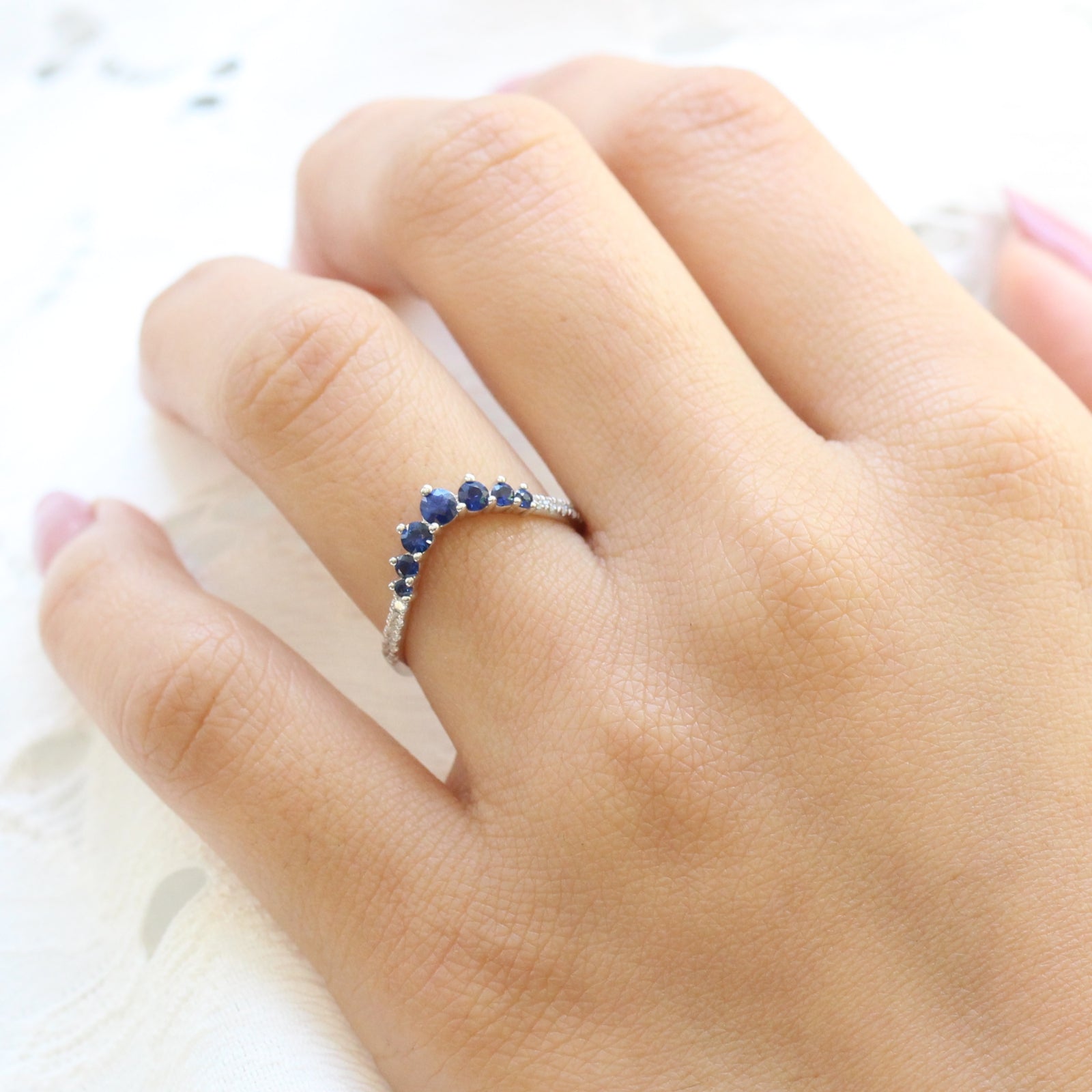 blue sapphire wedding ring in white gold curved diamond wedding band by la more design jewelry