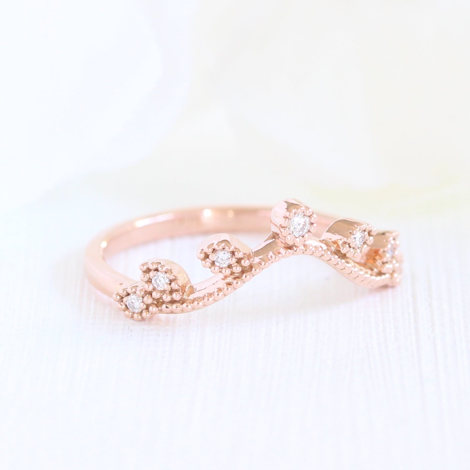 curved diamond wedding band in rose gold leaf ring by la more design
