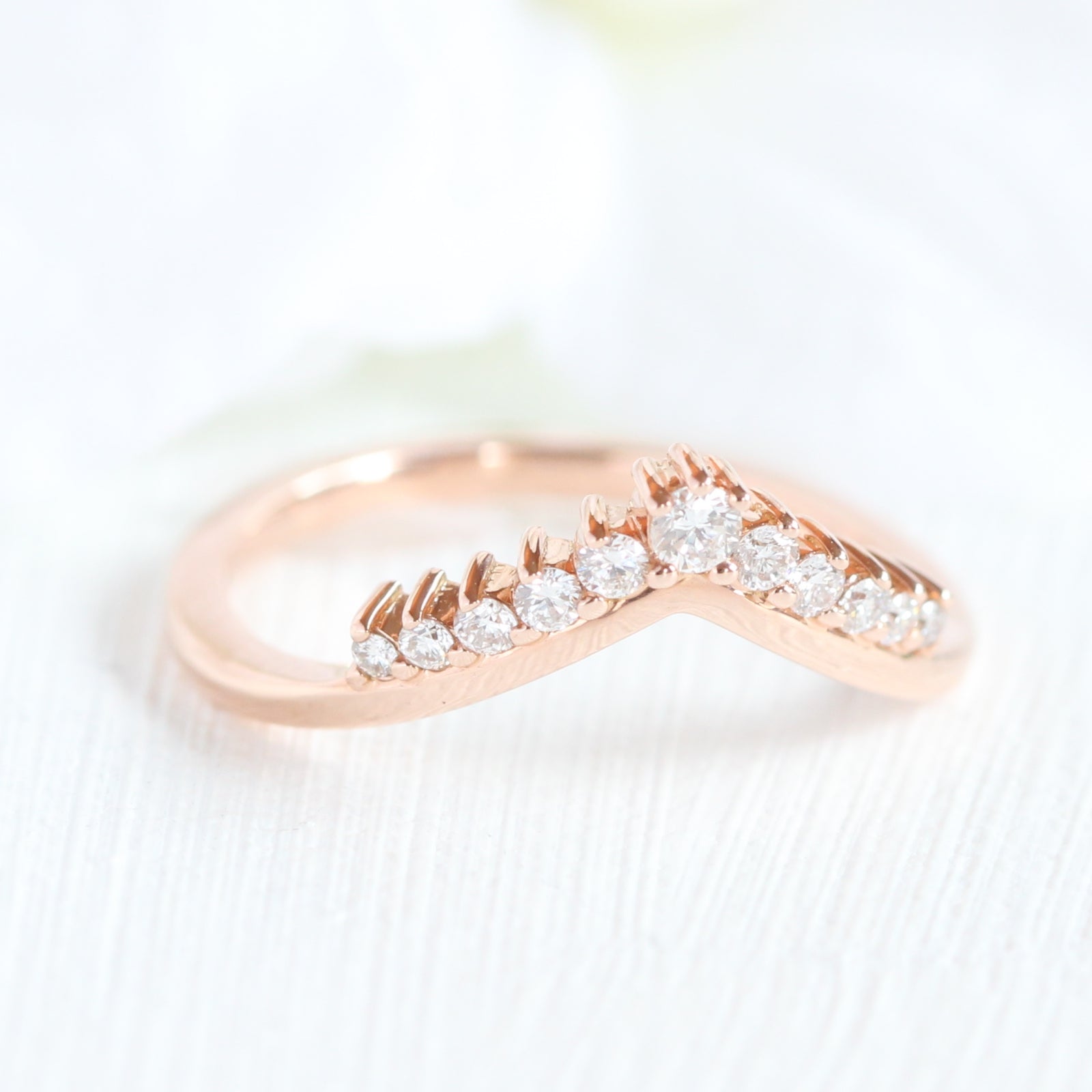 rose gold curved diamond wedding band in v shaped band by la more design