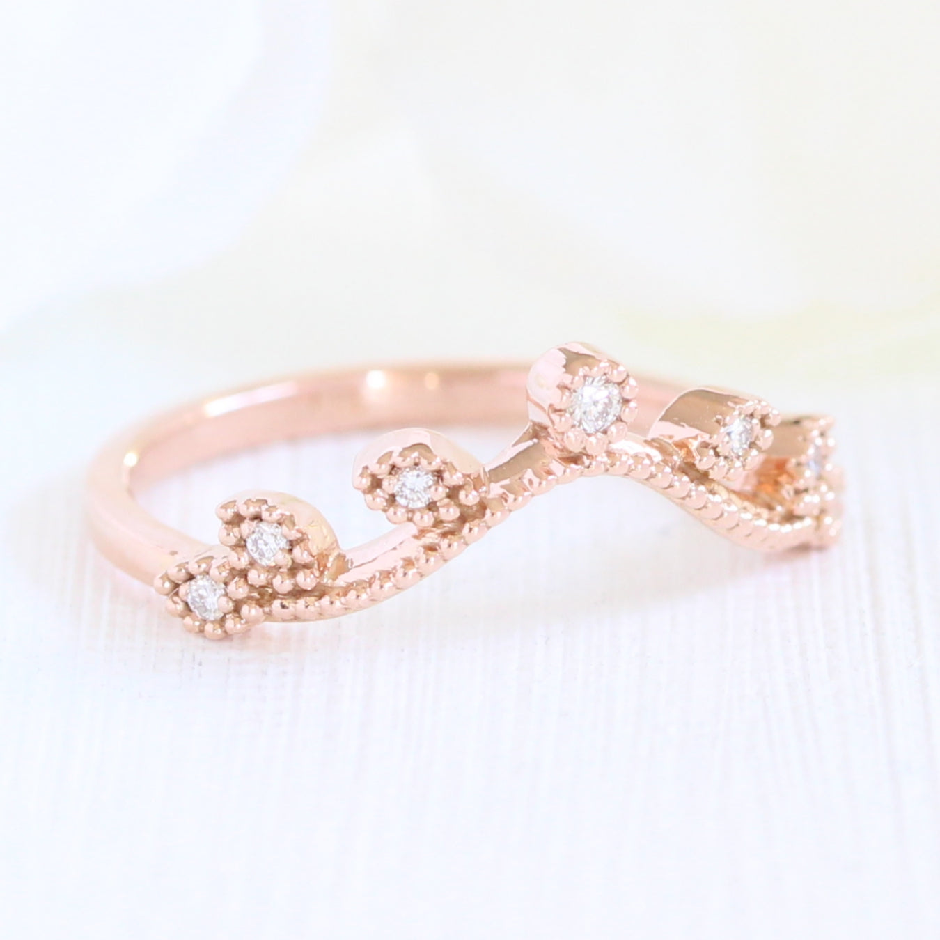 curved diamond wedding band in rose gold leaf ring by la more design jewelry