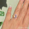 Breathtakingly unique and gorgeous creation! This lavender purple sapphire engagement ring is crafted in 14k rose gold tiara halo diamond ring setting with a large 1.70-carat marquise cut natural sapphire center ~ total gemstone and diamond weight of the whole ring is 2.32 ct.tw.  This stunning marquise-cut engagement ring will guarantee a big smile on your future bride's face! All our wedding bands can pair beautifully with this beautiful tiara halo diamond sapphire ring!