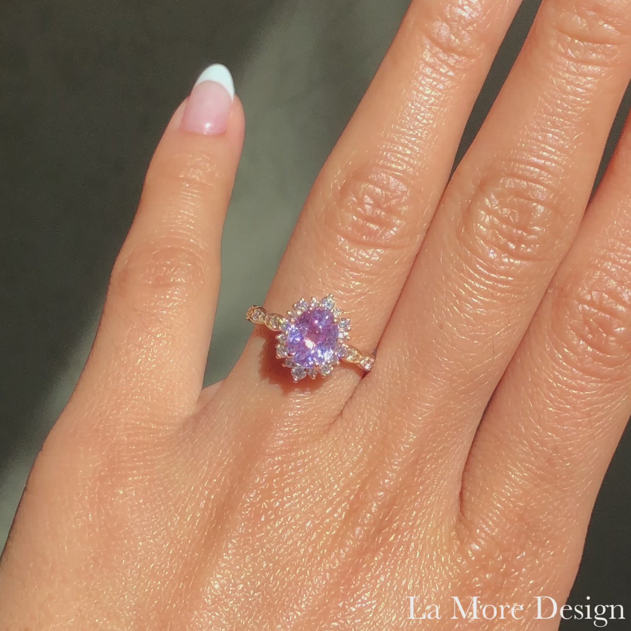 This timelessly elegant and unique lavender purple sapphire engagement ring is crafted in a 14k rose gold Tiara Halo Diamond ring setting with a large 2.26-carat oval cut natural sapphire center ~the total gemstone and diamond weight of the whole ring is 2.76 ct.tw.  This one-of-a-kind sapphire ring is perfect for brides looking for non-traditional engagement rings. All our wedding bands can pair beautifully with this gorgeous tiara halo diamond sapphire ring!