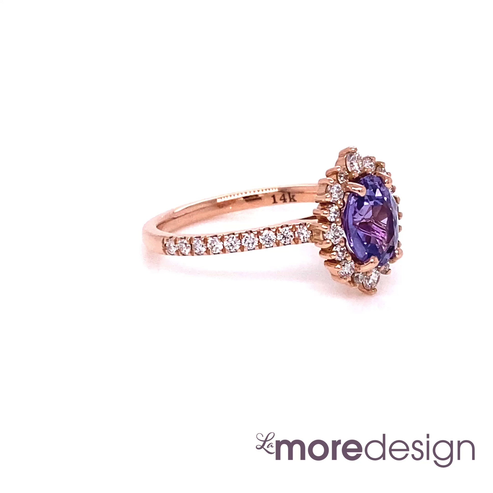 This timelessly gorgeous and unique purple sapphire engagement ring is crafted in a 14k rose gold Tiara Halo Diamond ring setting with a 1.44-carat oval cut natural sapphire center ~ the total gemstone and diamond weight of the whole ring is 1.94 ct.tw.  This one-of-a-kind sapphire ring is perfect for brides looking for non-traditional engagement rings. All our wedding bands can pair beautifully with this gorgeous halo diamond sapphire ring!