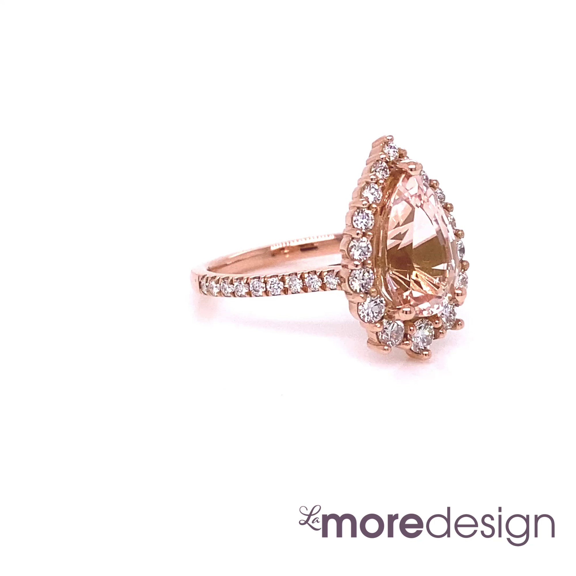 Breathtakingly unique and stunning! This morganite engagement ring is crafted in 14k rose gold Tiara Halo Diamond ring setting with a large 2.21-carat pear cut natural peach morganite center ~ total gemstone and diamond weight of the whole ring is 2.91 ct.tw. This one-of-a-kind pear-cut engagement ring is perfect for brides looking for diamond alternative engagement rings! All our wedding bands can pair beautifully with this gorgeous halo diamond morganite ring!