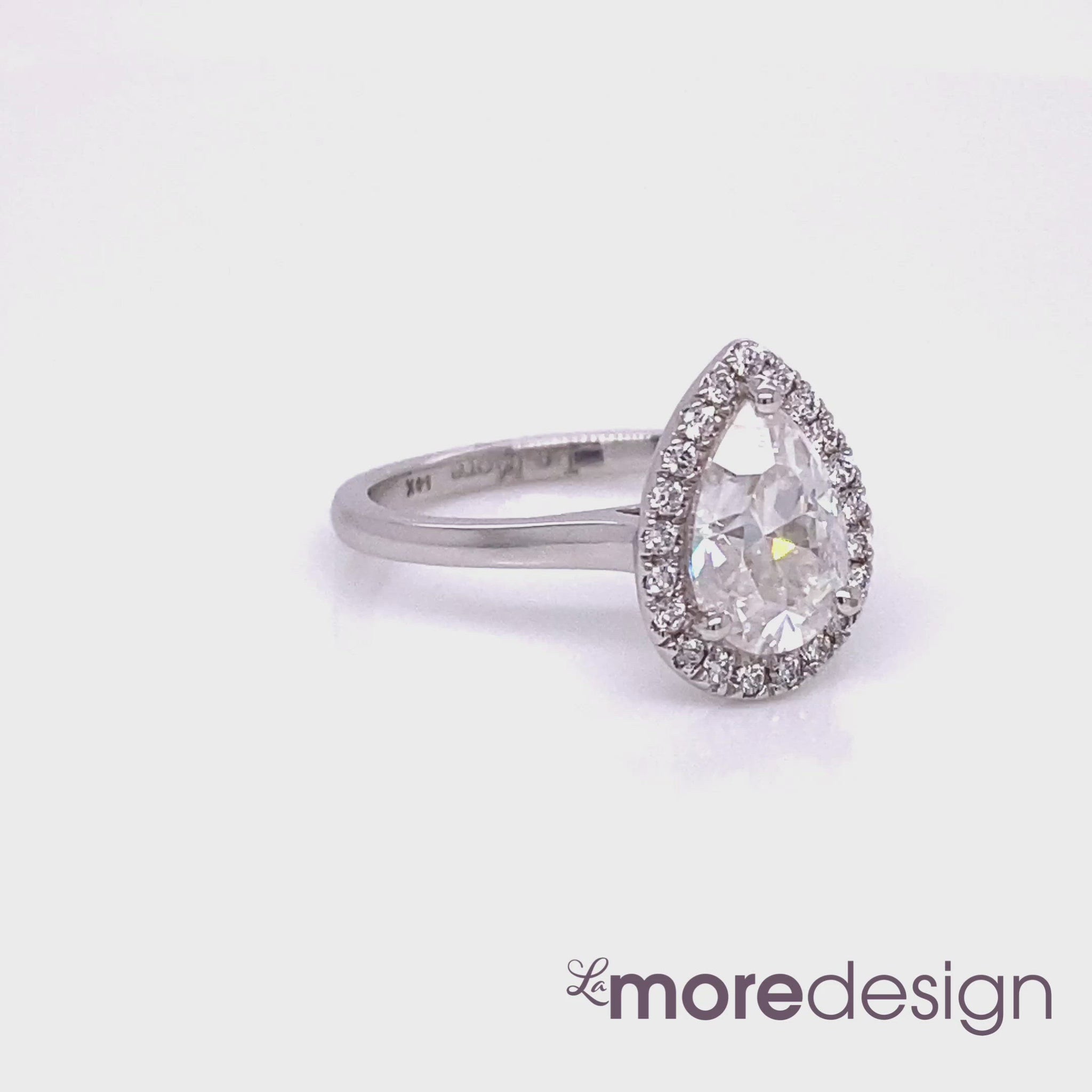 white gold pear moissanite halo diamond engagement ring by la more design