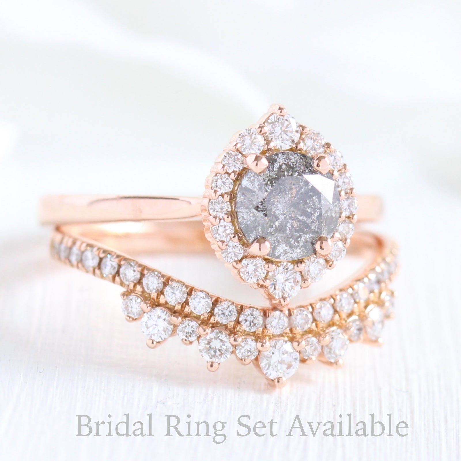 Salt and pepper diamond ring and curved crown diamond wedding band in rose gold halo bridal ring set by la more design jewelry