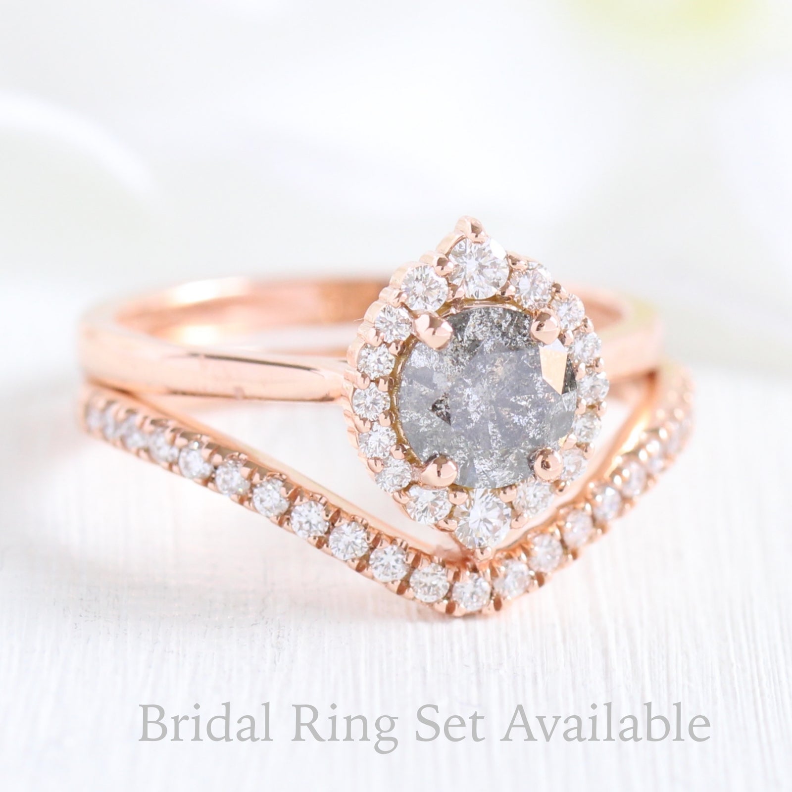 salt and pepper grey diamond ring and curved diamond wedding band in rose gold halo bridal ring set by la more design jewelry