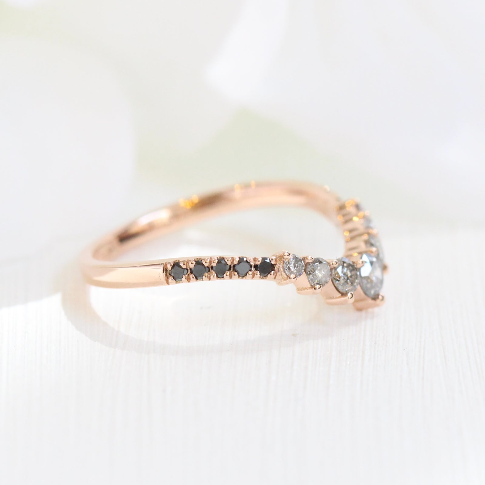 grey salt and pepper diamond wedding ring in rose gold curved pave black diamond band by la more design jewelry