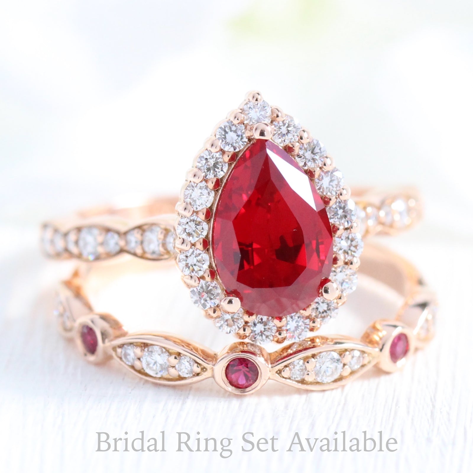 halo diamond pear ruby engagement ring rose gold bridal set ruby diamond wedding band by la more design jewelry