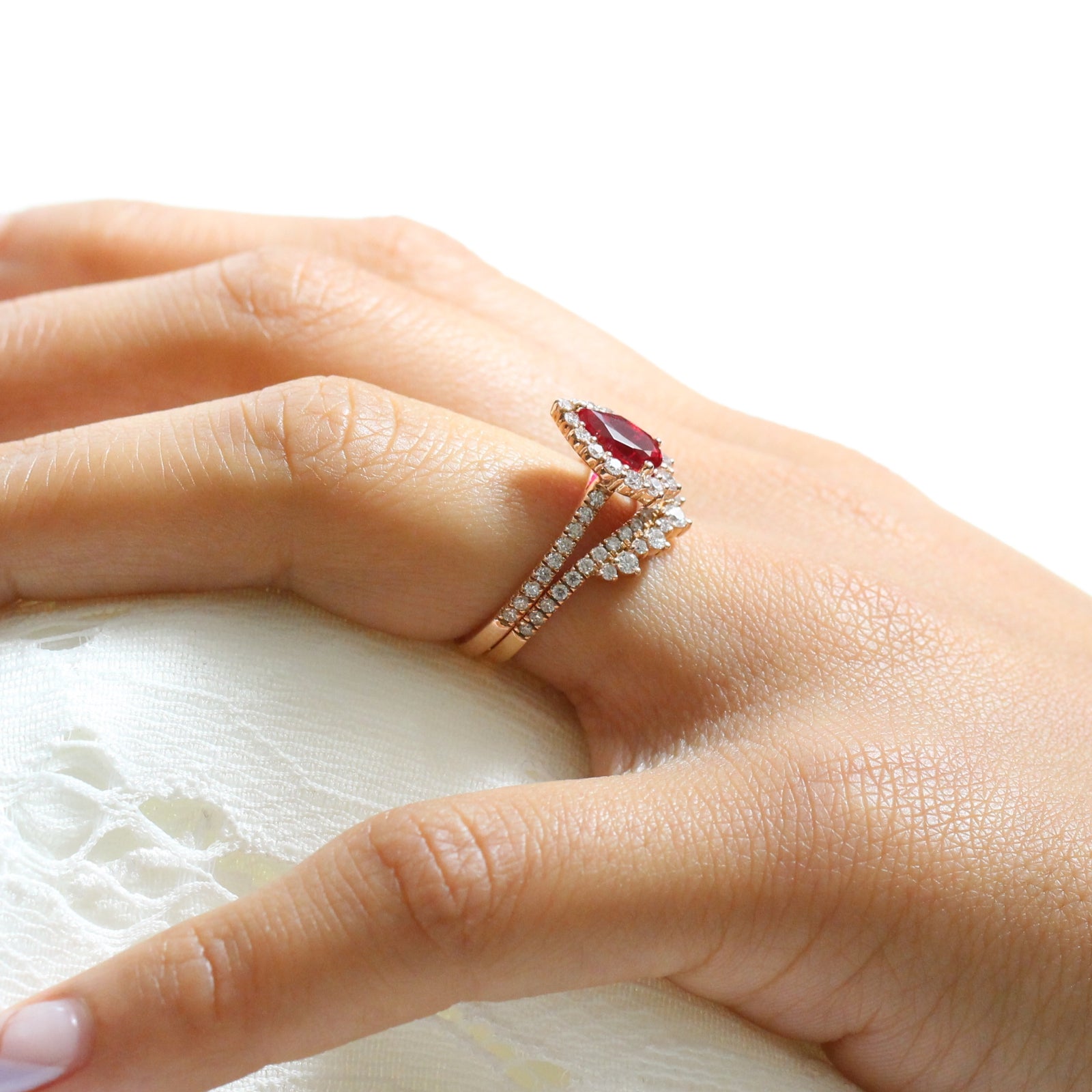 halo diamond ruby engagement ring bridal set rose gold and curved crown diamond wedding band by la more design jewelry