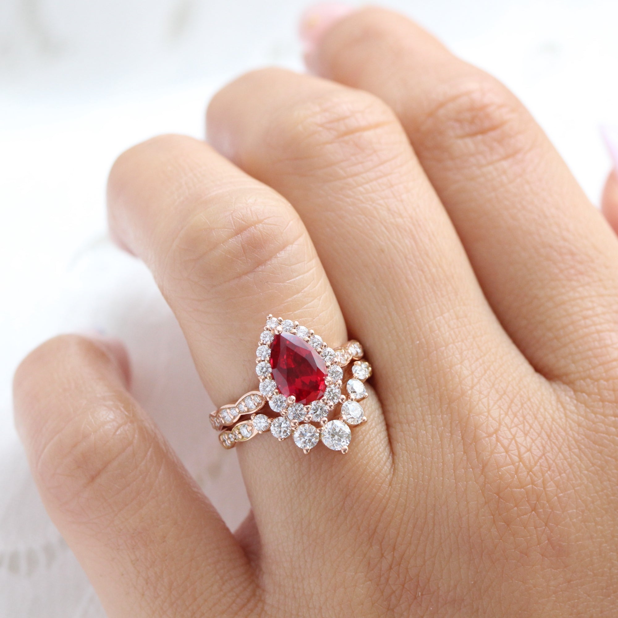 halo diamond large pear ruby ring stack rose gold deep curved wedding band la more design jewelry