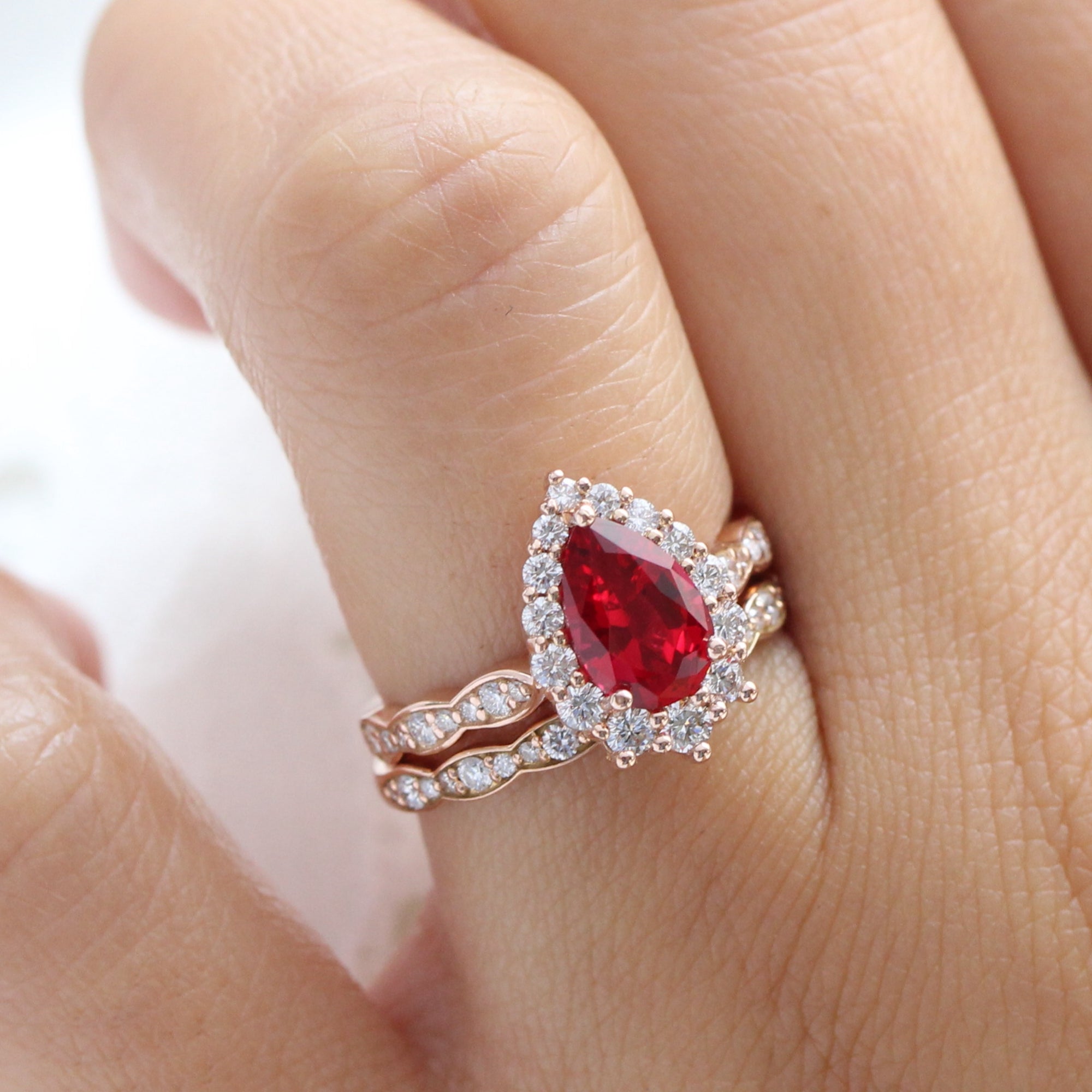 halo diamond large pear ruby ring stack rose gold eternity wedding band la more design jewelry