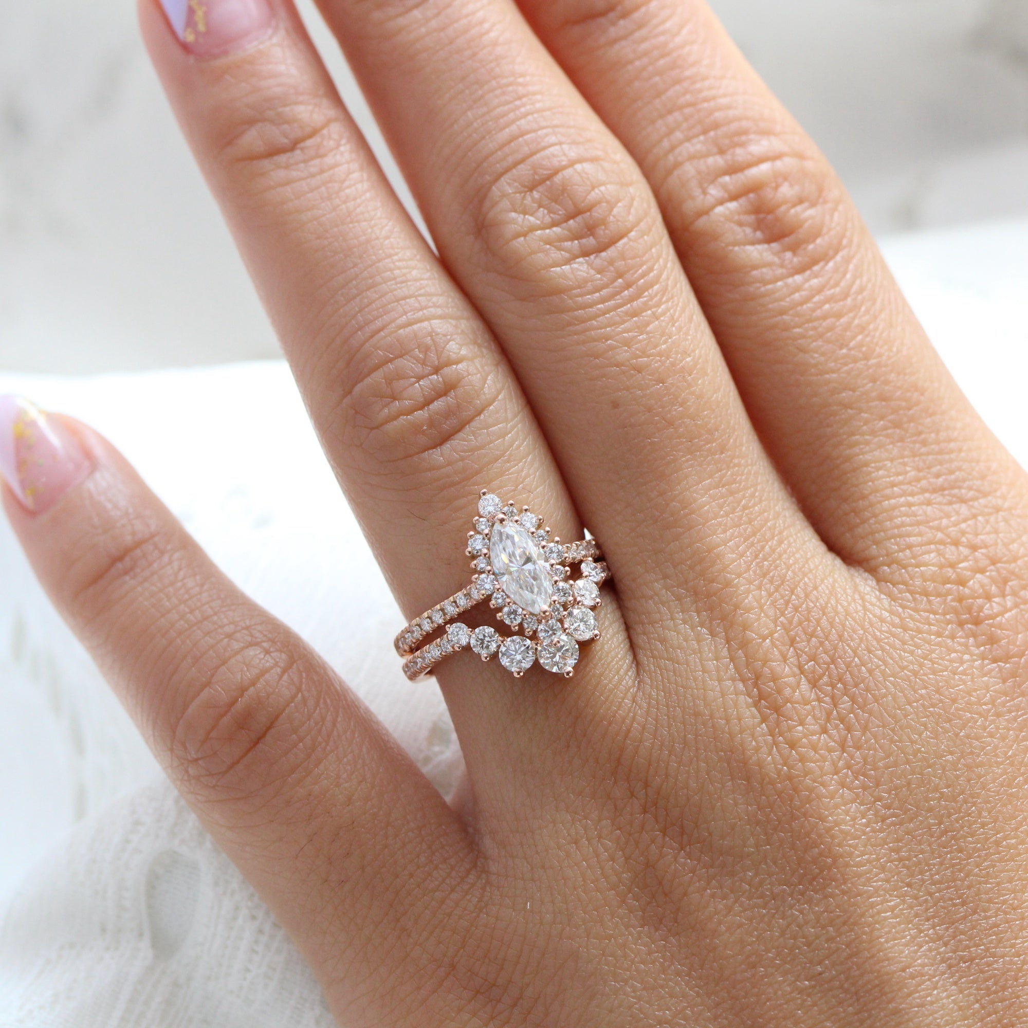 halo diamond marquise moissanite engagement ring rose gold curved wedding band bridal set la more design jewelry