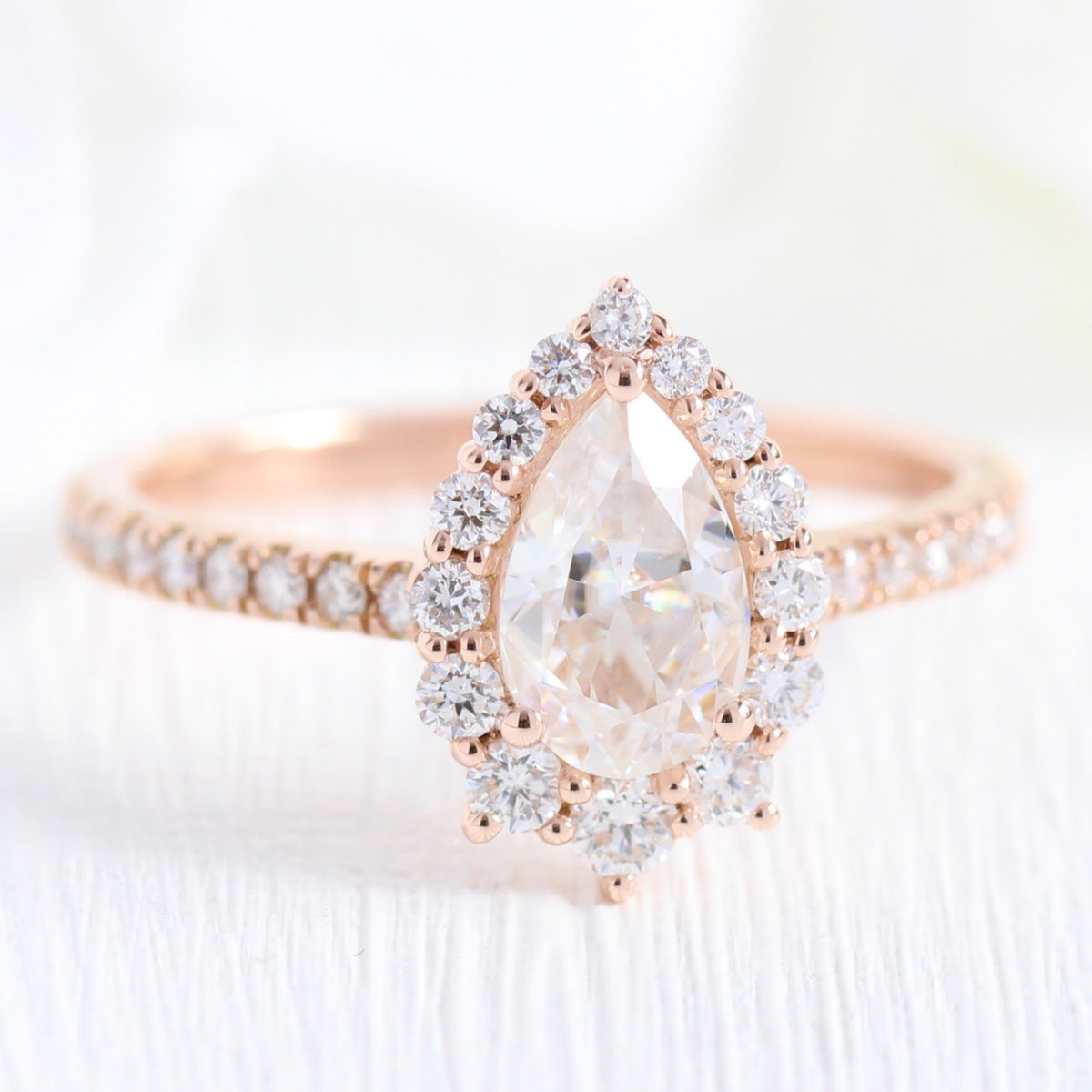 Pear cut moissanite engagement ring rose gold halo diamond ring by la more design jewelry