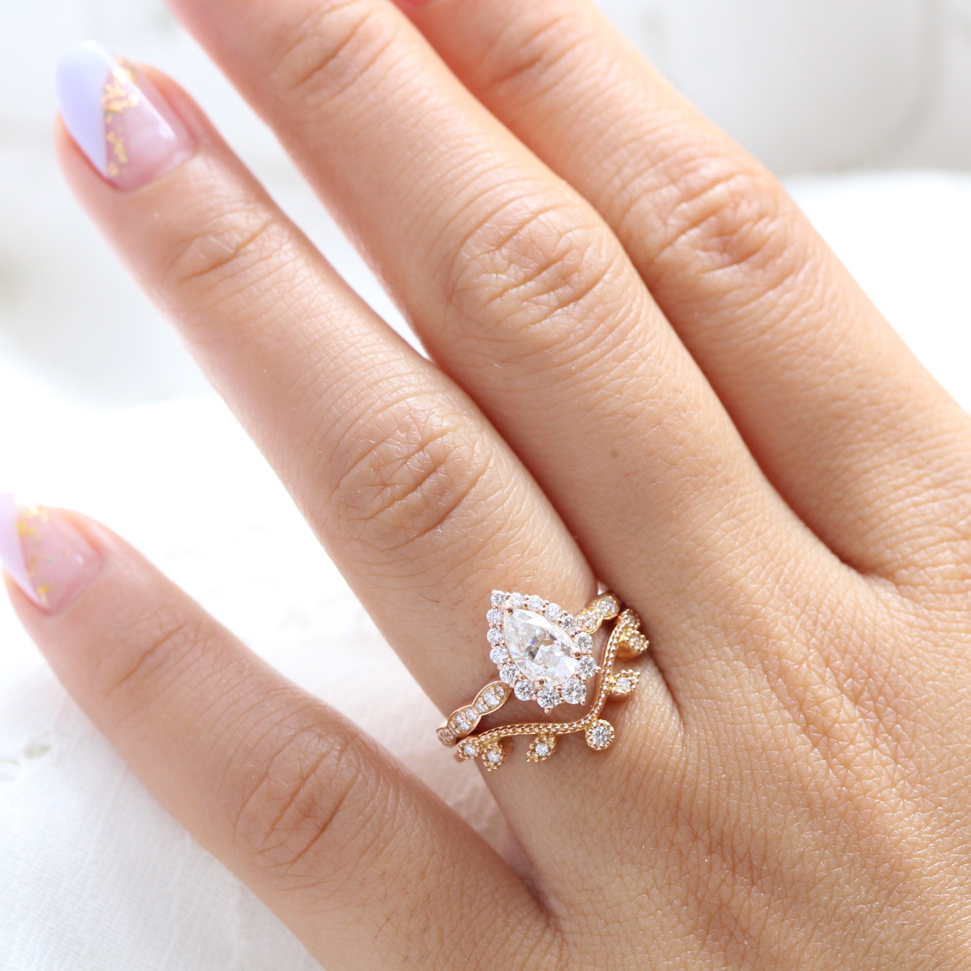 halo diamond pear moissanite engagement ring and curved wedding band la more design jewelry