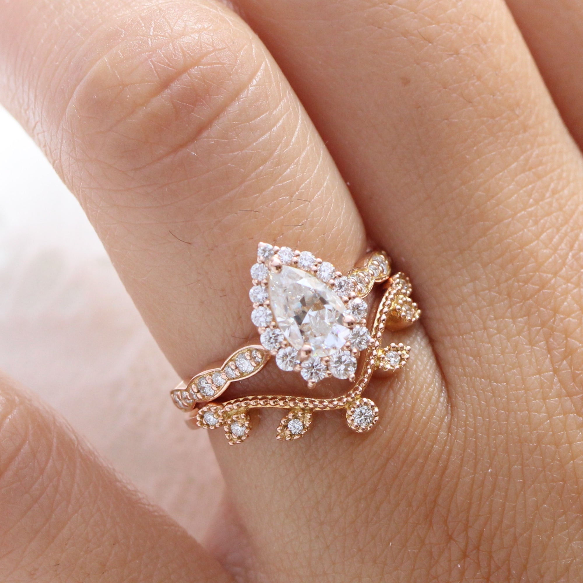 halo diamond pear moissanite engagement ring and curved wedding band la more design jewelry