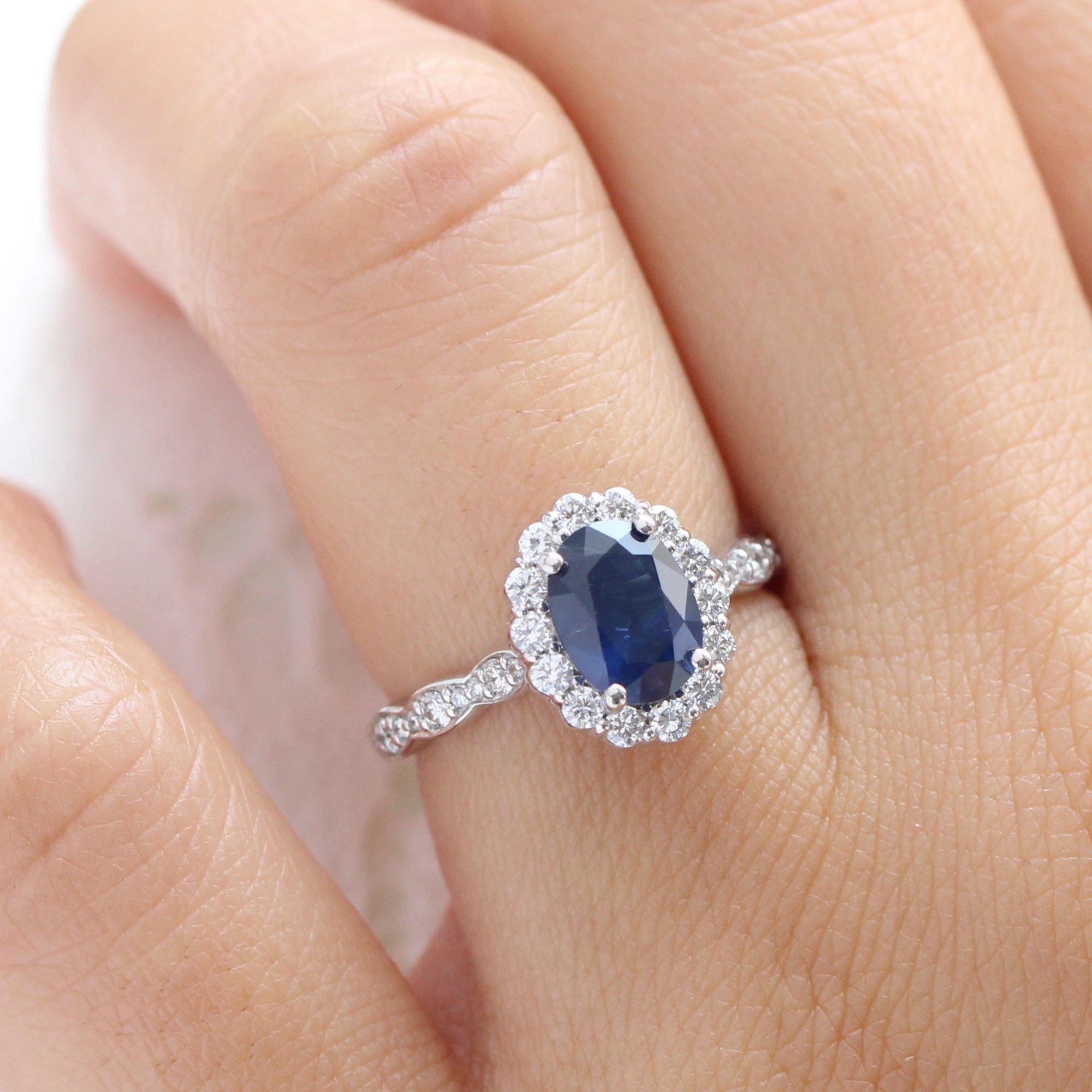 halo diamond sapphire engagement ring in white gold scalloped band by la more design jewelry