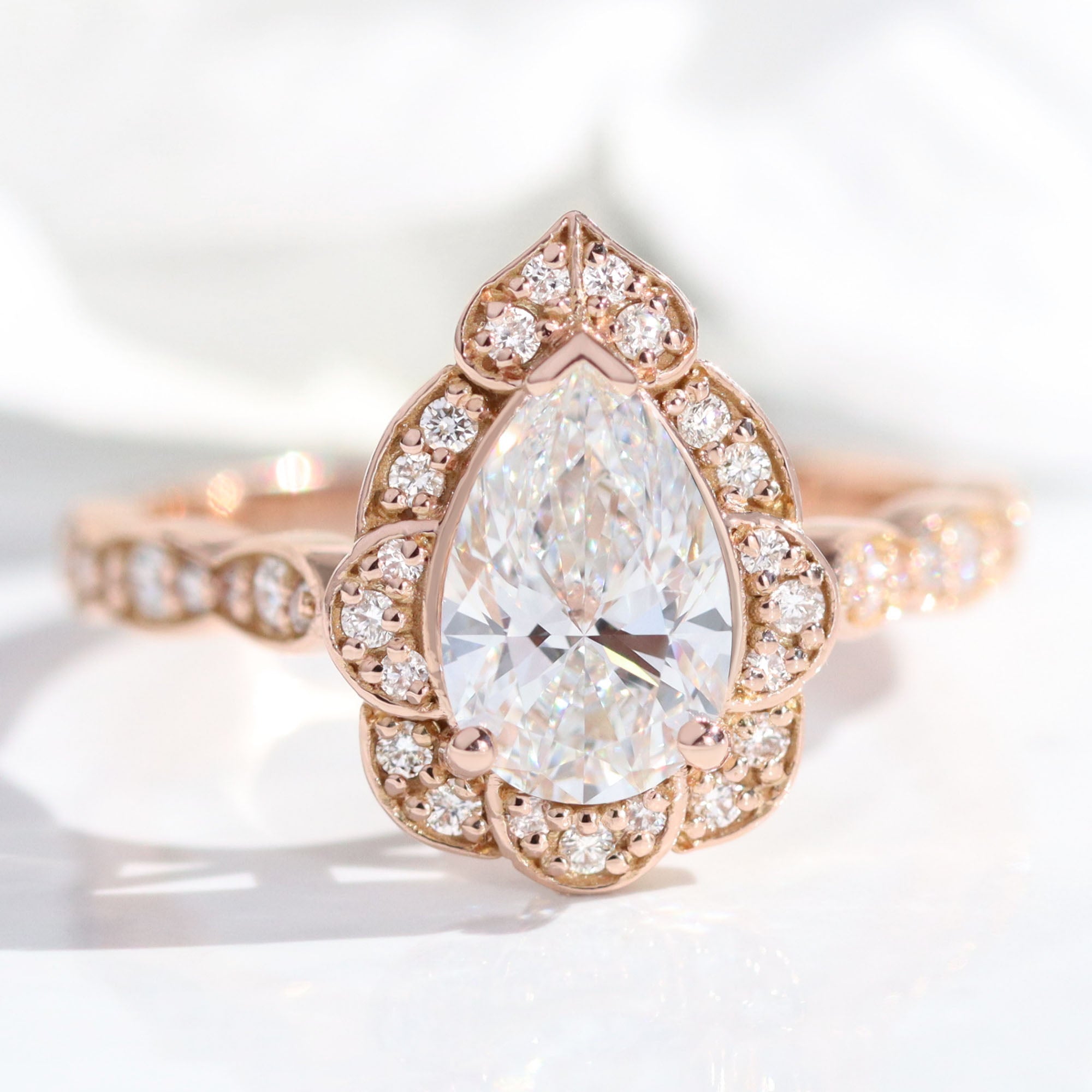 Vintage style pear shaped engagement ring top