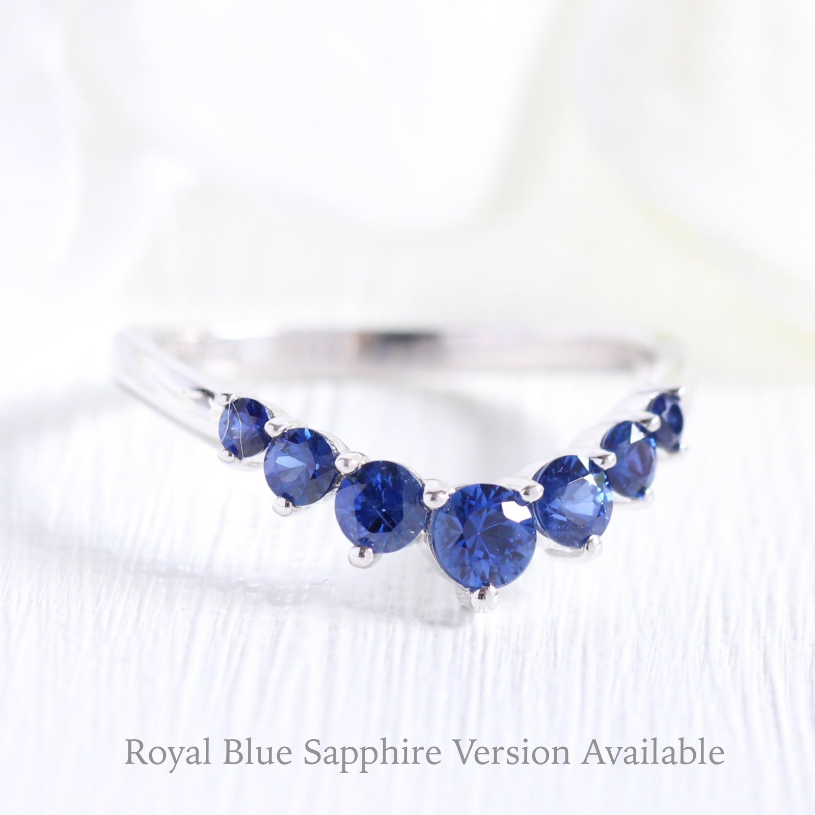 large sapphire wedding band in white gold half eternity curved wedding ring by la more design jewelry