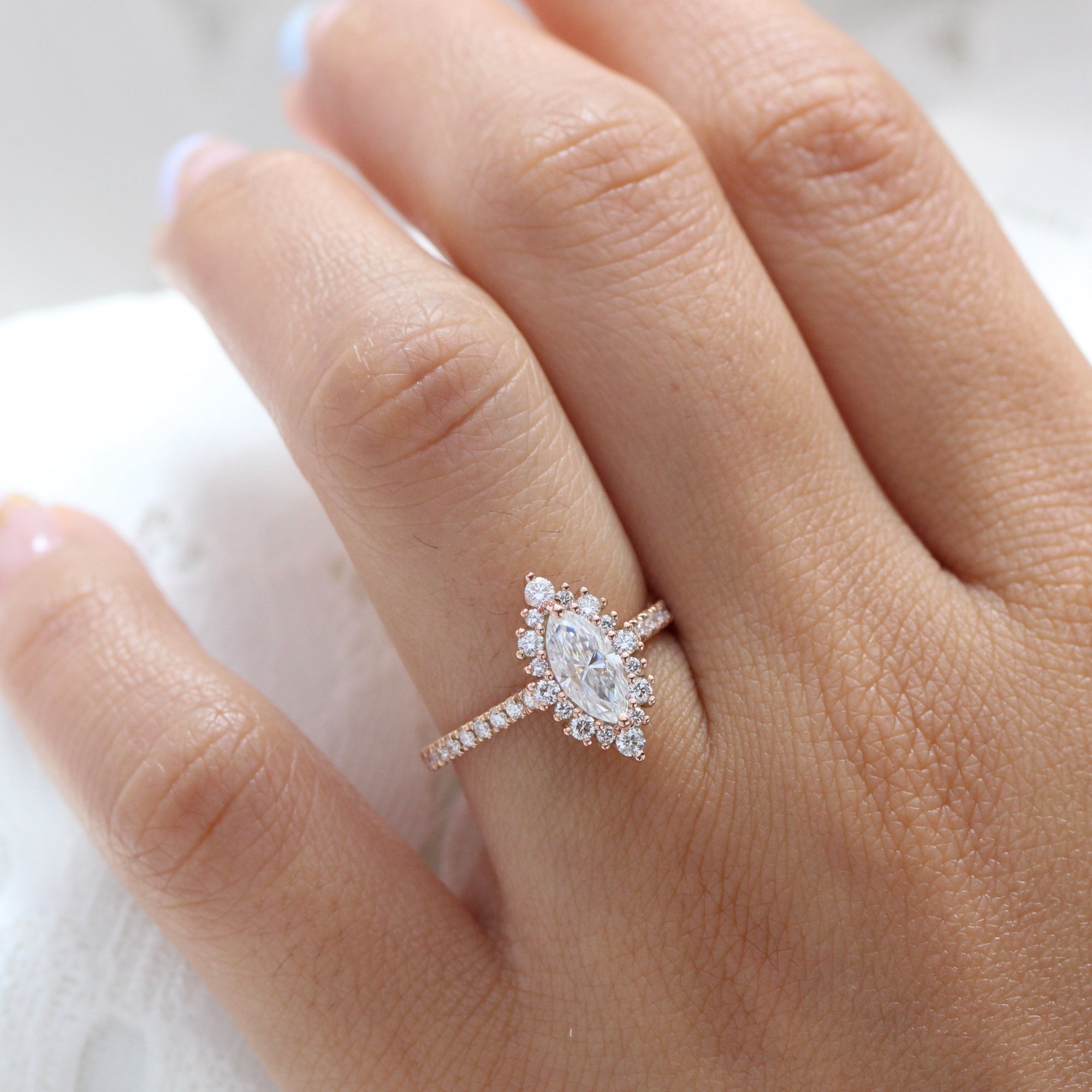 marquise moissanite engagement ring rose gold halo diamond pave band la more design jewelry