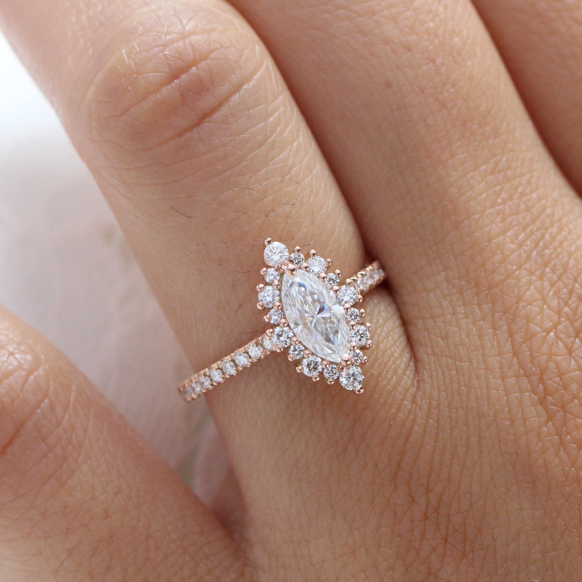 marquise moissanite engagement ring rose gold halo diamond pave band la more design jewelry