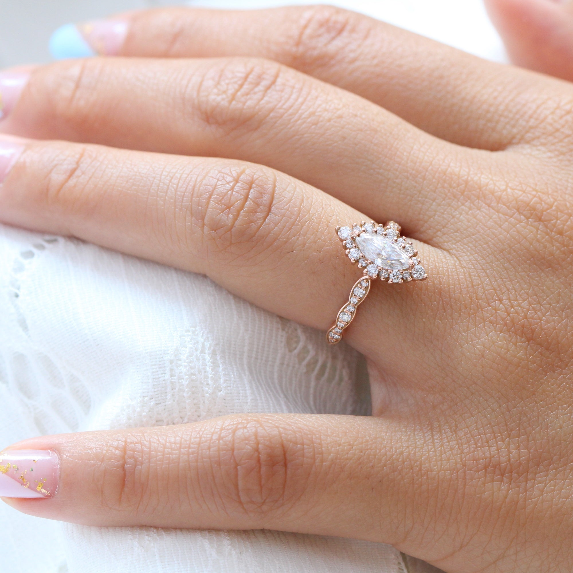 marquise moissanite engagement ring rose gold halo diamond scalloped band la more design jewelry