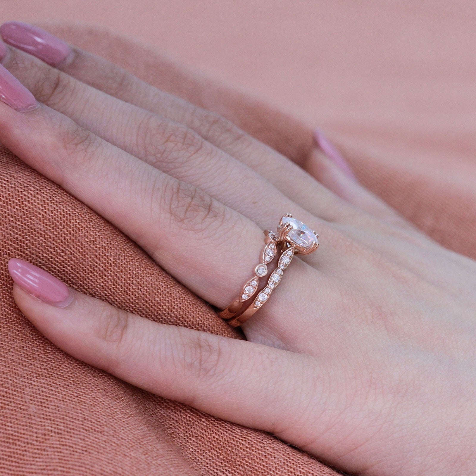 solitaire moissanite ring bridal set in rose gold bezel scalloped diamond band by la more design