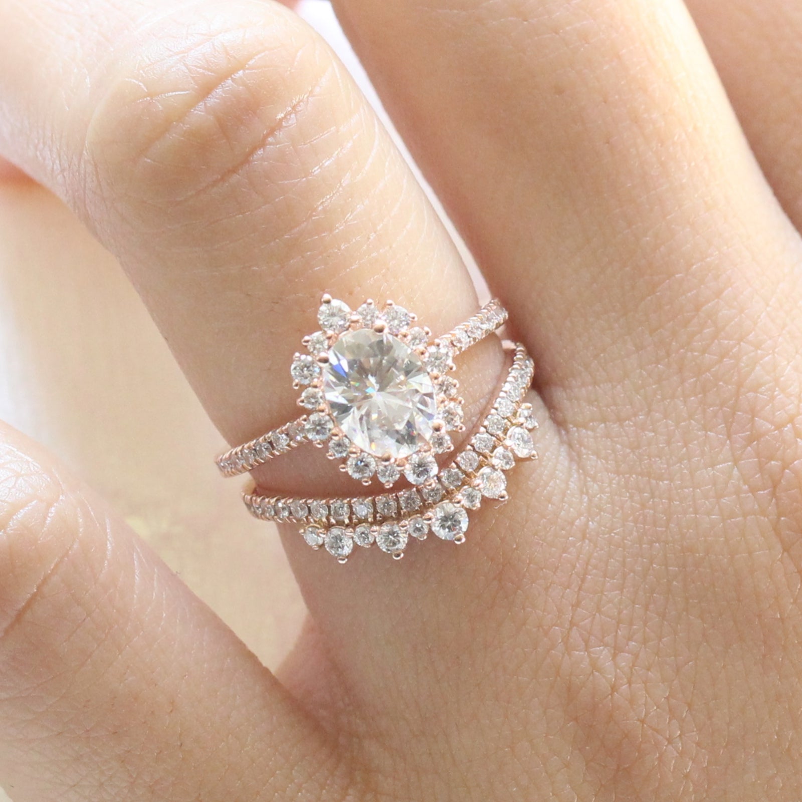 oval moissanite engagement ring halo diamond bridal set rose gold and crown diamond wedding band by la more design jewelry