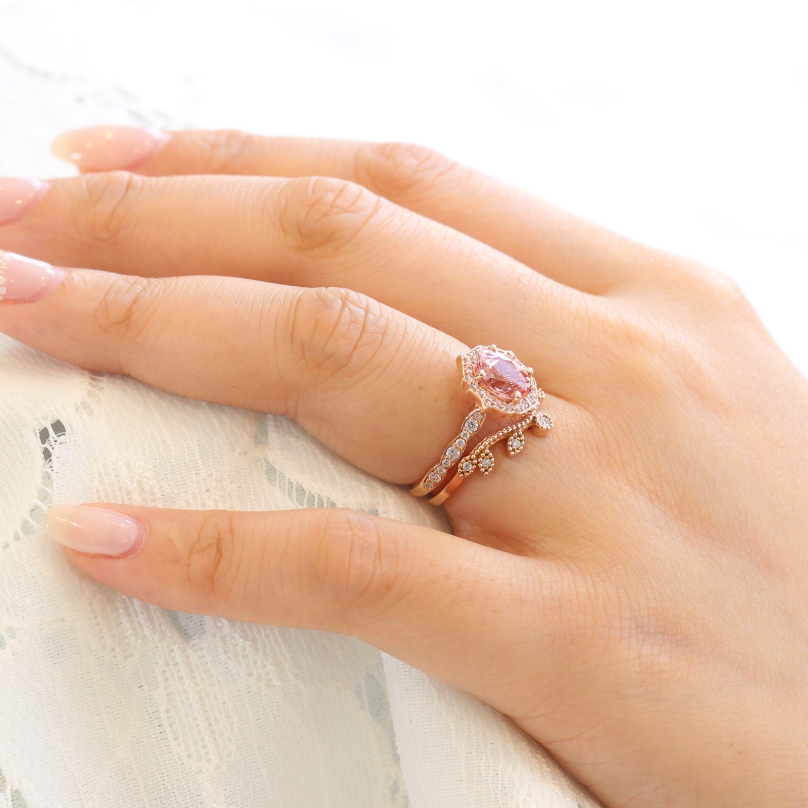 oval peach sapphire ring and curved leaf diamond band bridal set in rose gold by la more design