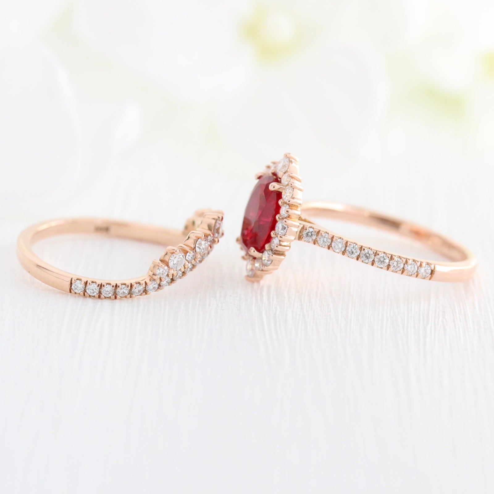oval ruby engagement ring rose gold halo diamond bridal set and crown diamond wedding band by la more design jewelry