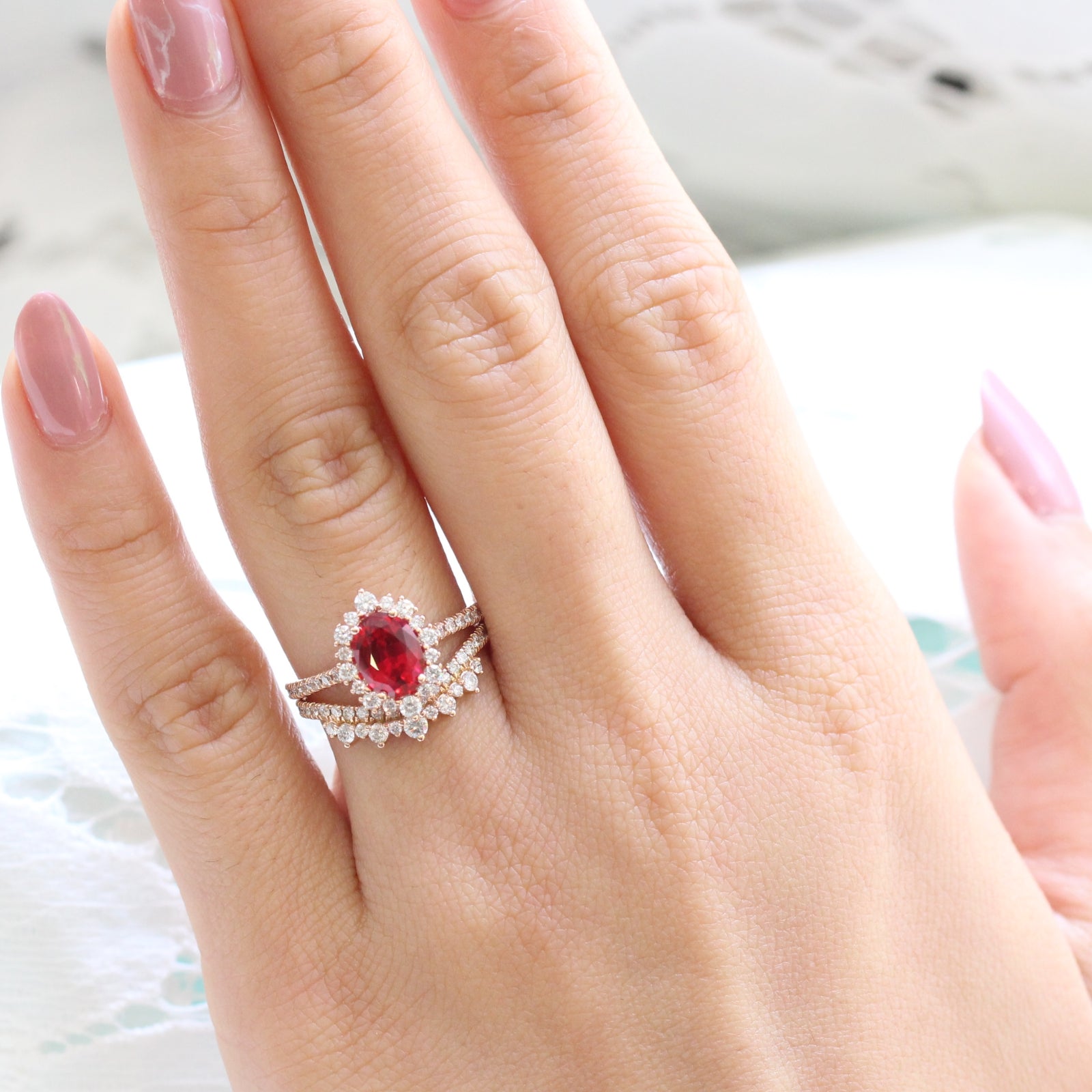 oval ruby engagement ring rose gold halo diamond bridal set and crown diamond wedding band by la more design jewelry