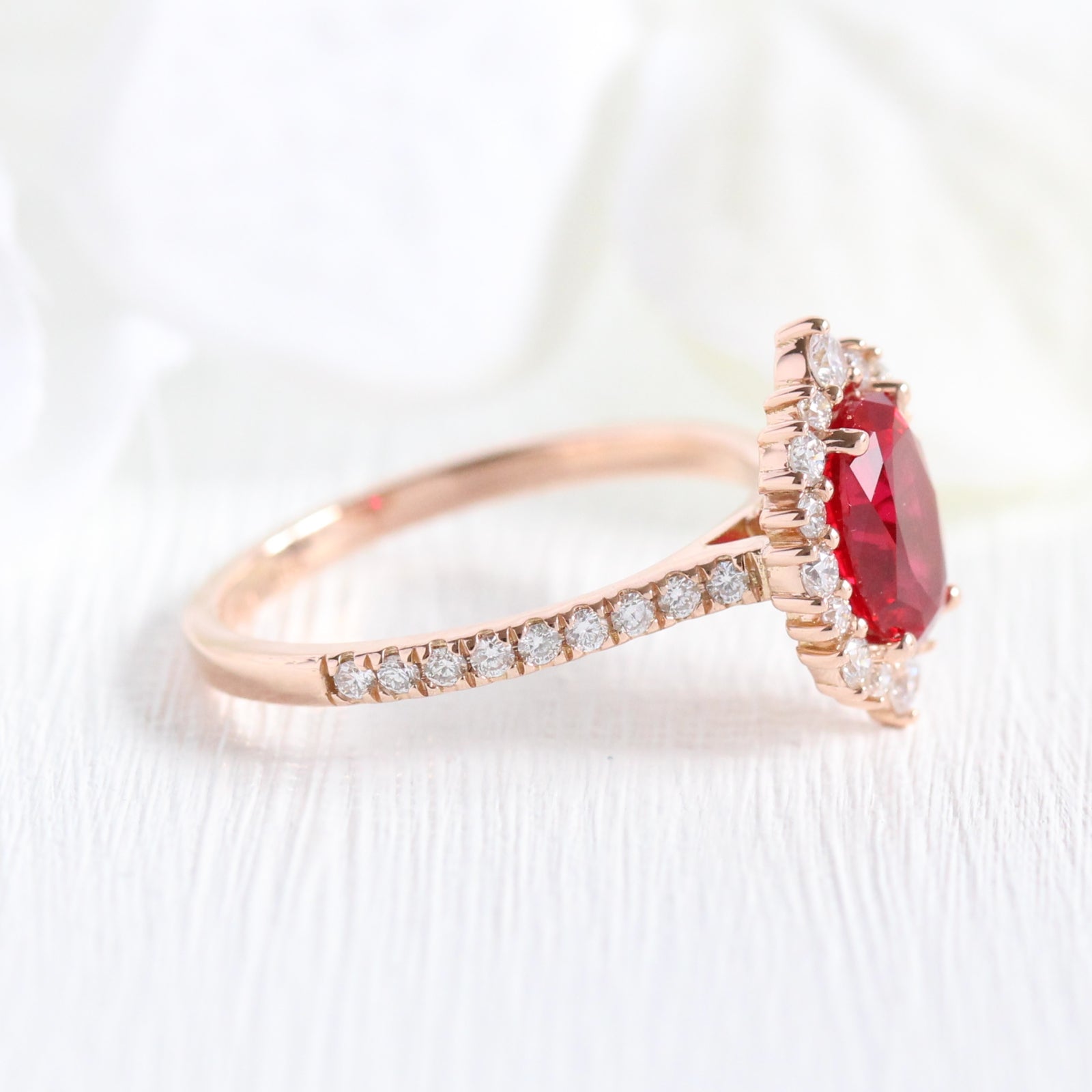 oval ruby engagement ring rose gold halo diamond ring low profile ring by la more design jewelry