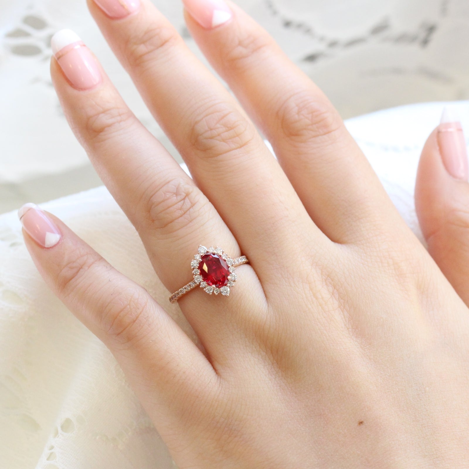 oval ruby engagement ring rose gold halo diamond ring low profile ring by la more design jewelry