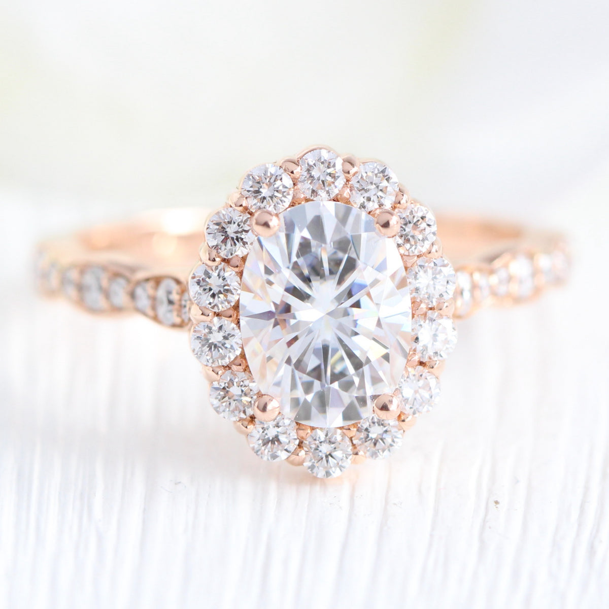 oval moissanite engagement ring in rose gold halo diamond ring by la more design jewelry