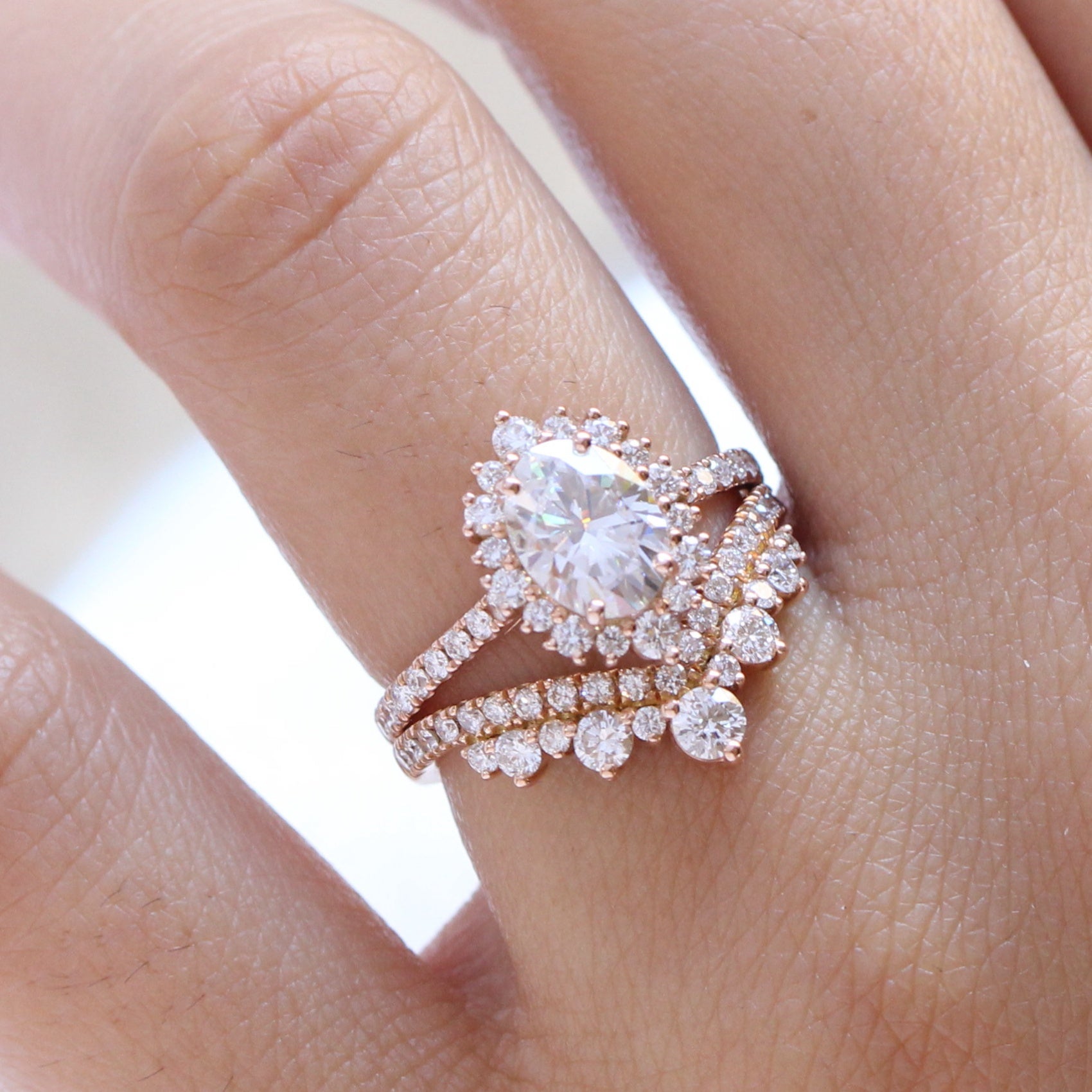oval moissanite engagement ring rose gold V shaped diamond wedding ring stacking set la more design jewelry
