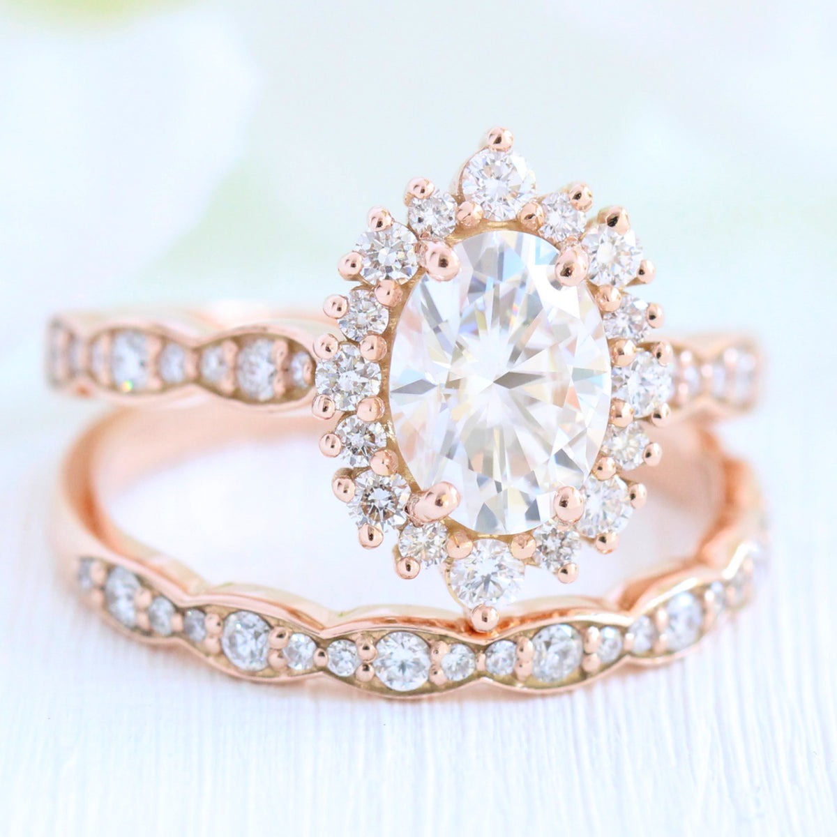 oval moissanite engagement ring rose gold halo diamond bridal set and diamond wedding band by la more design jewelry