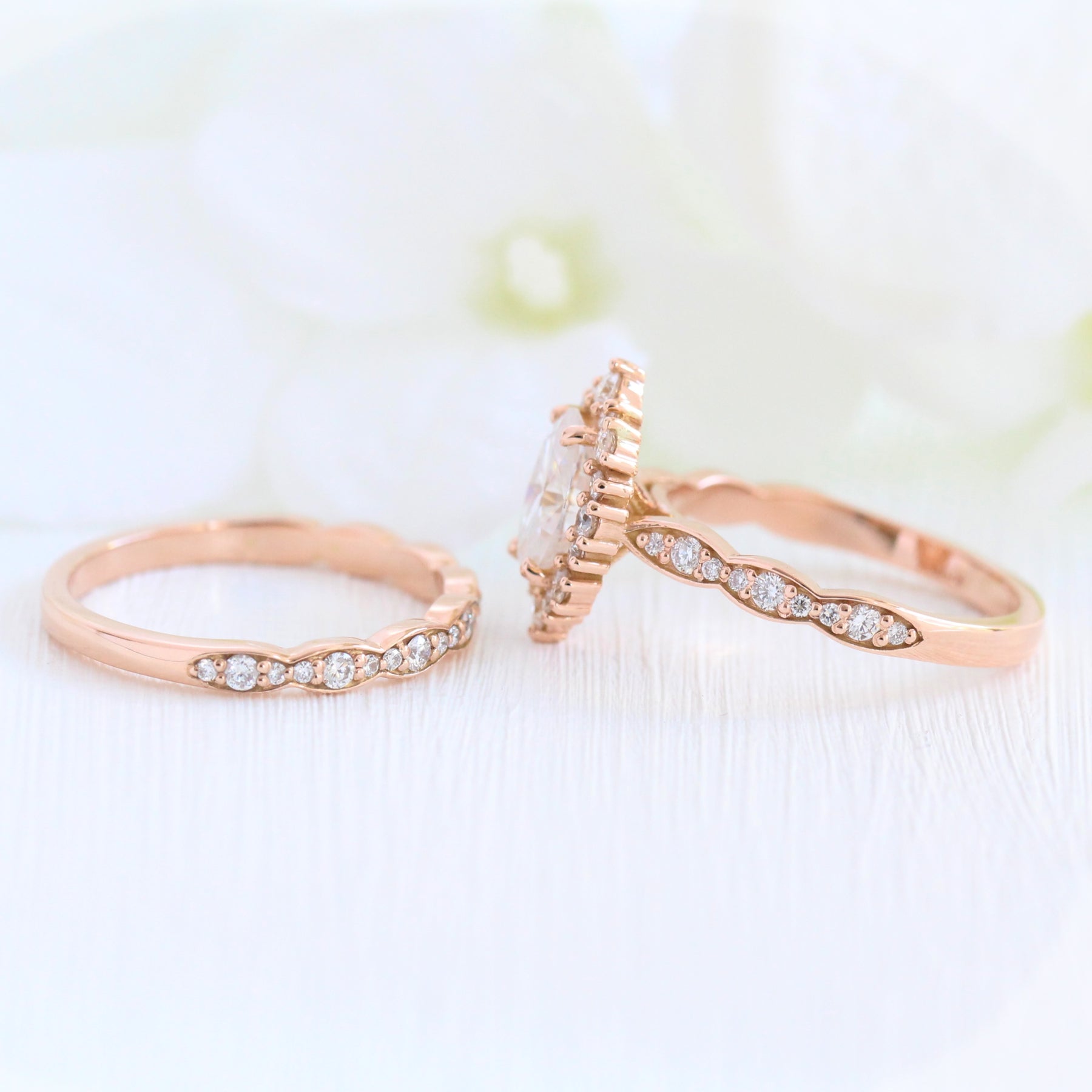 oval moissanite engagement ring rose gold halo diamond bridal set and diamond wedding band by la more design jewelry